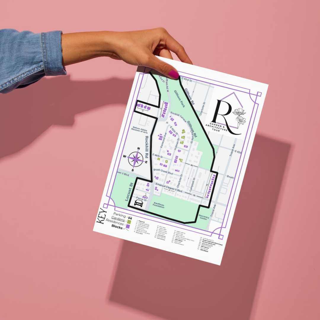 Hand holding a map of a garden and architecture tour, with streets, block boundaries, a compass, and legend, against a pink background.