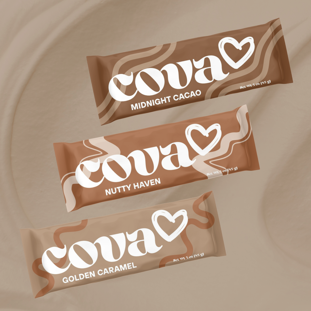 Three Coval chocolate bars labeled Midnight Cacao, Nutty Haven, and Golden Caramel lying on a beige surface.