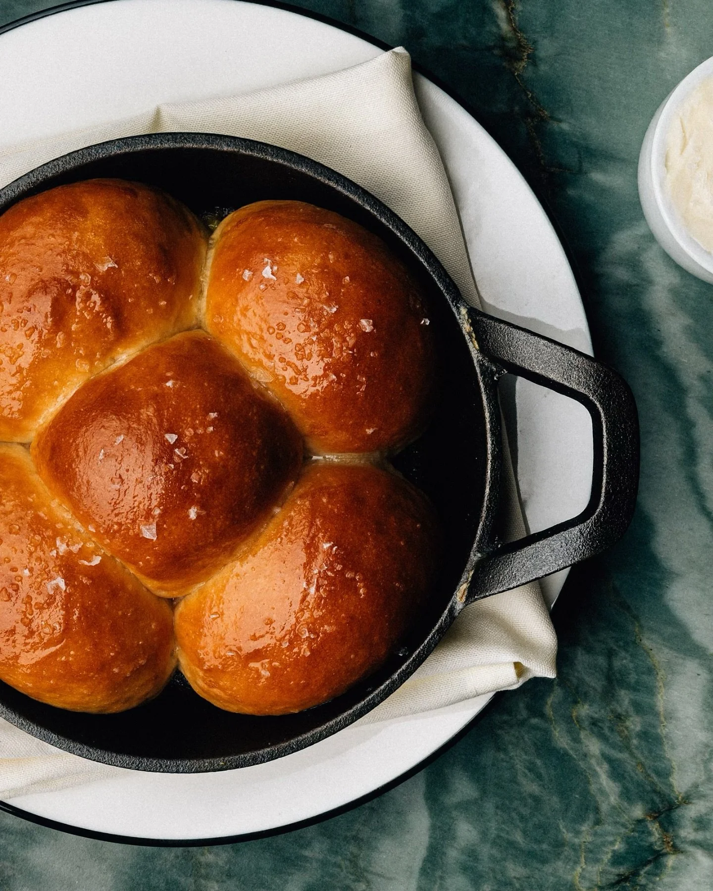 Setting the tone. 

Housemade Parker House Rolls &bull; Whipped Cultured Butter &bull; Sea Salt