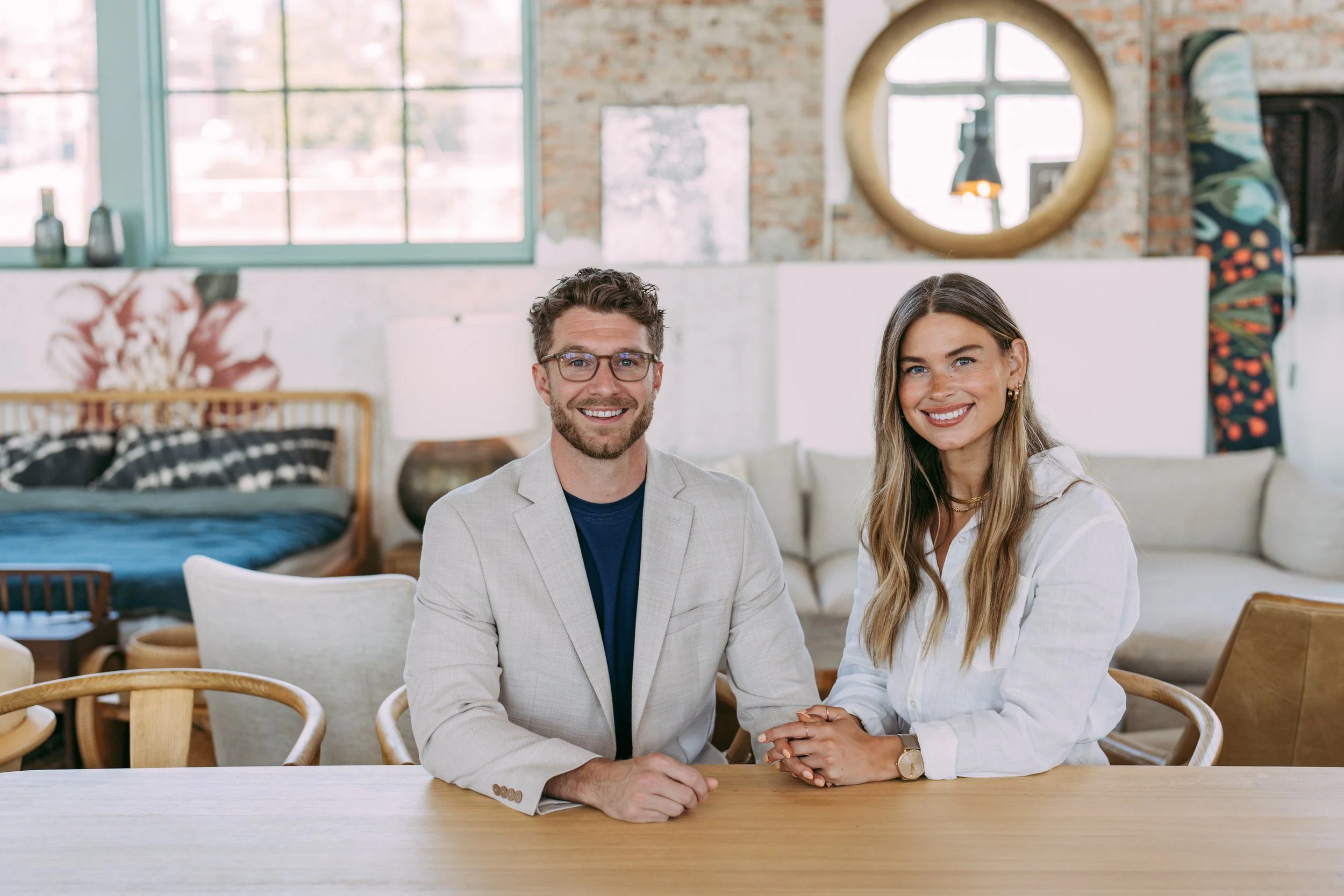 A photo of Katie and Chad Hersey, a luxury real estate husband and wife team in Gig Harbor, Washington.
