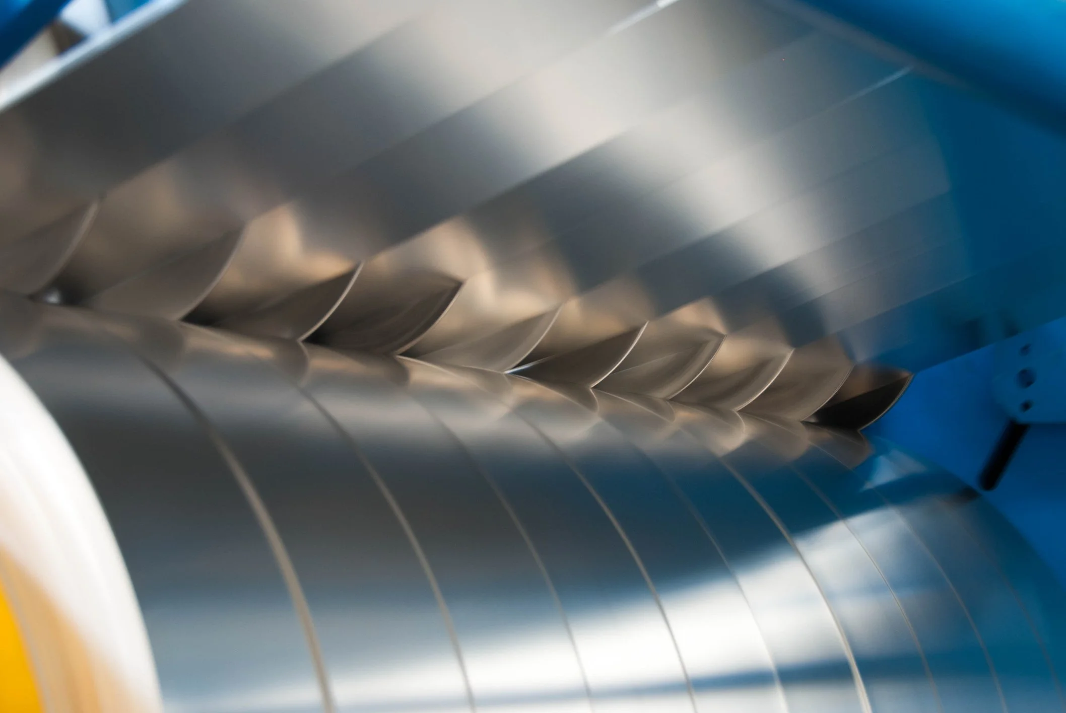 Close-up of coil slitting process.