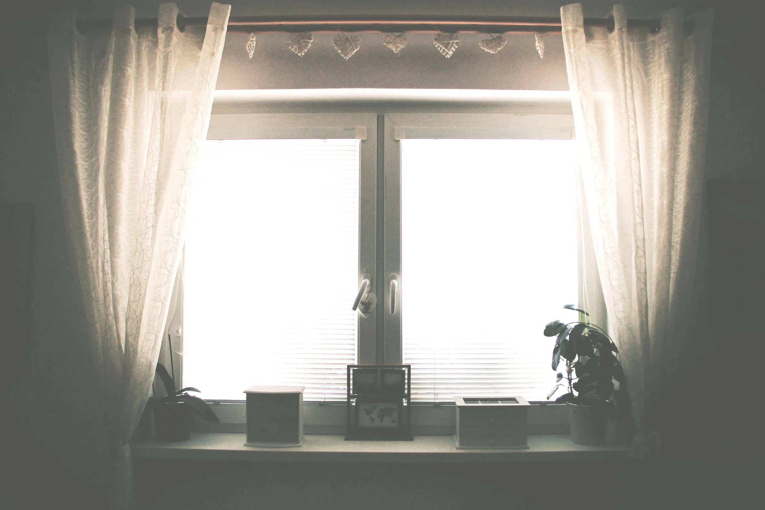 Window with lots of bright light coming into room representing over activated nervous system