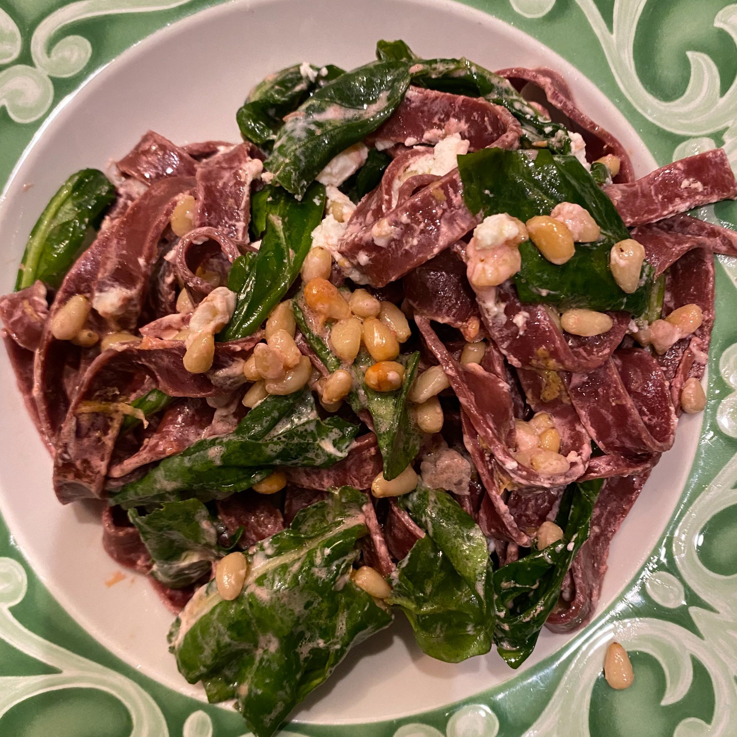 fresh beet pasta, spinach, pinnoli nuts, goat cheese