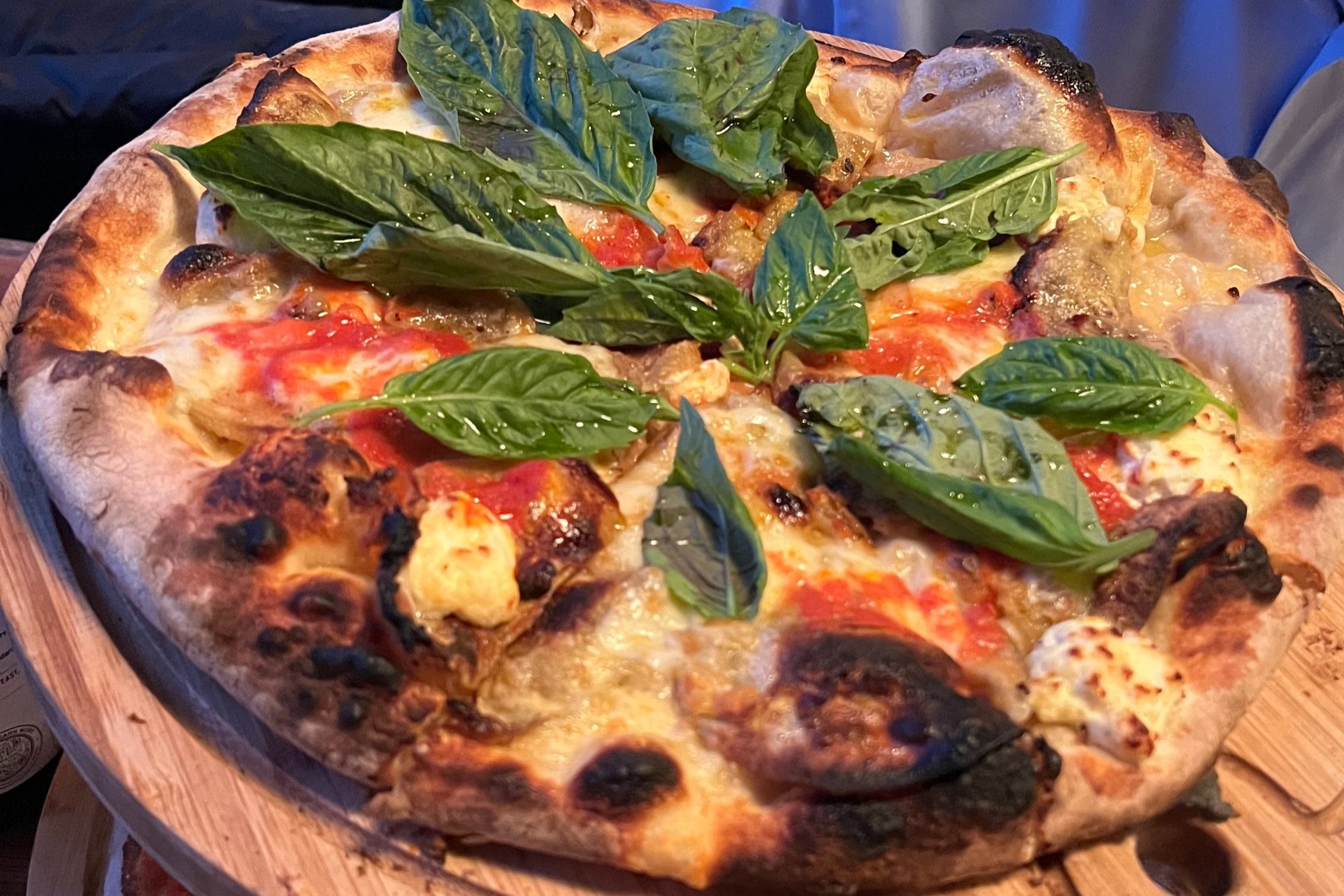 fired in the pizza oven for 90 seconds: tomato, ricotta, fried eggplant, basil