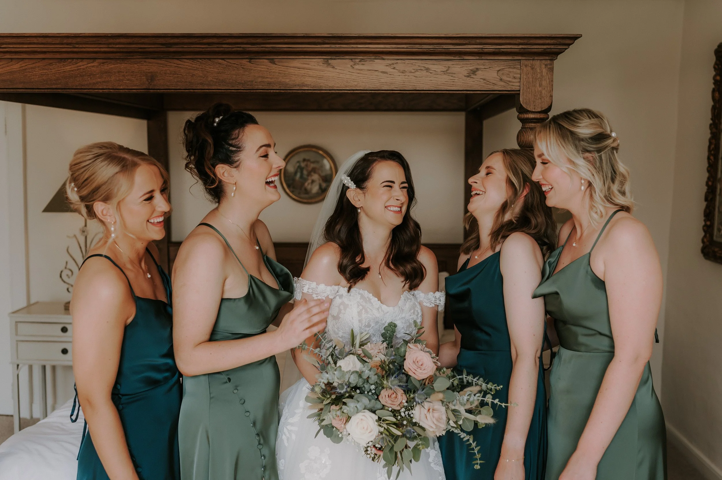 Bride and bridesmaid in exclusive use wedding venue in Suffolk
