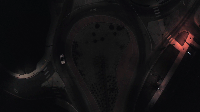 Aerial Drone Night Drive Roundabout Zodiac Shot.gif