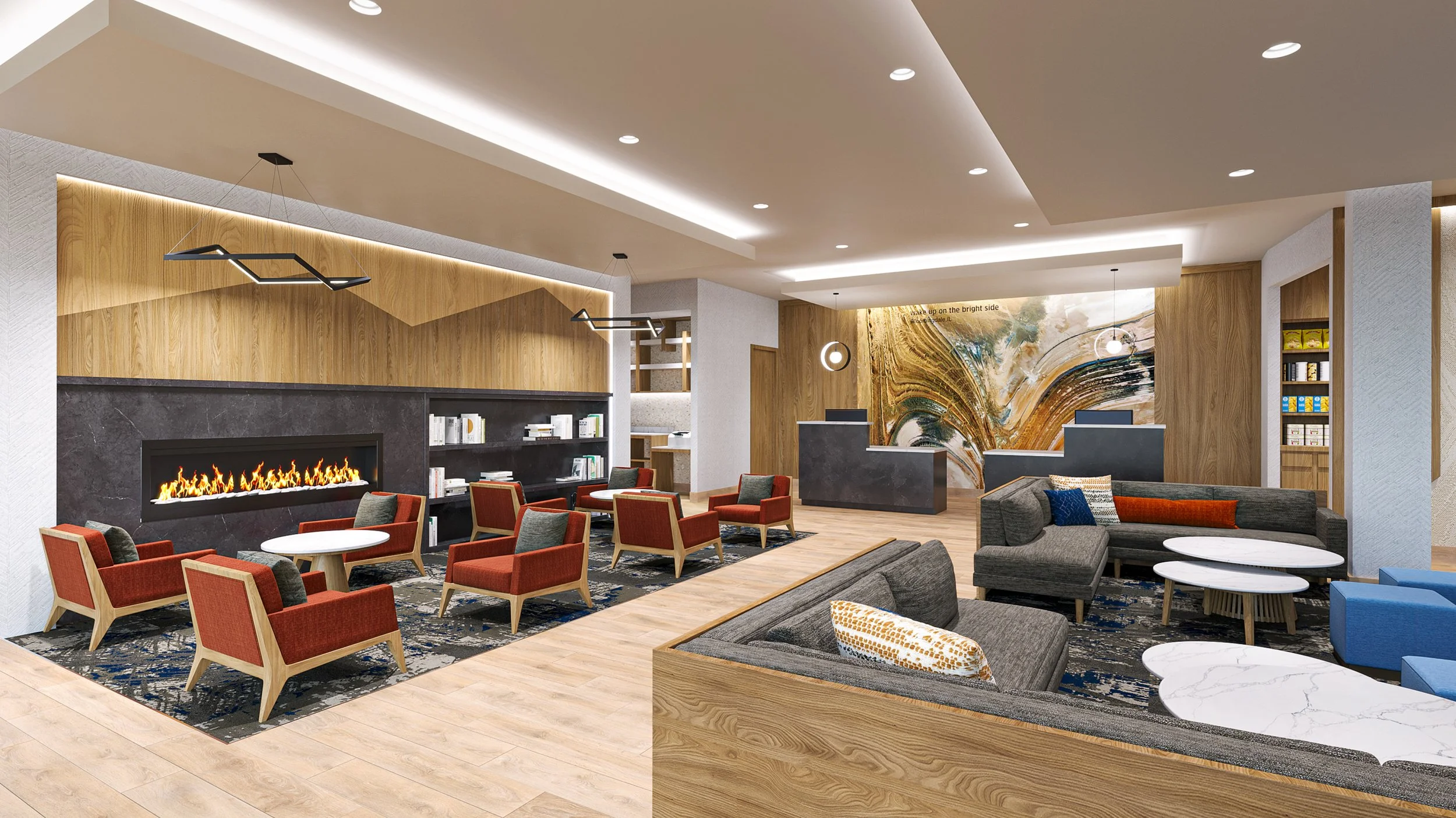Modern hotel lobby with seating area, fireplace, and reception desk.