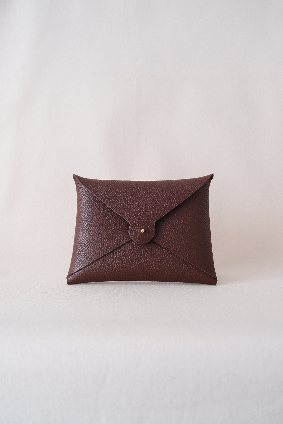 AMAL_Passport_Oxblood_Front.png