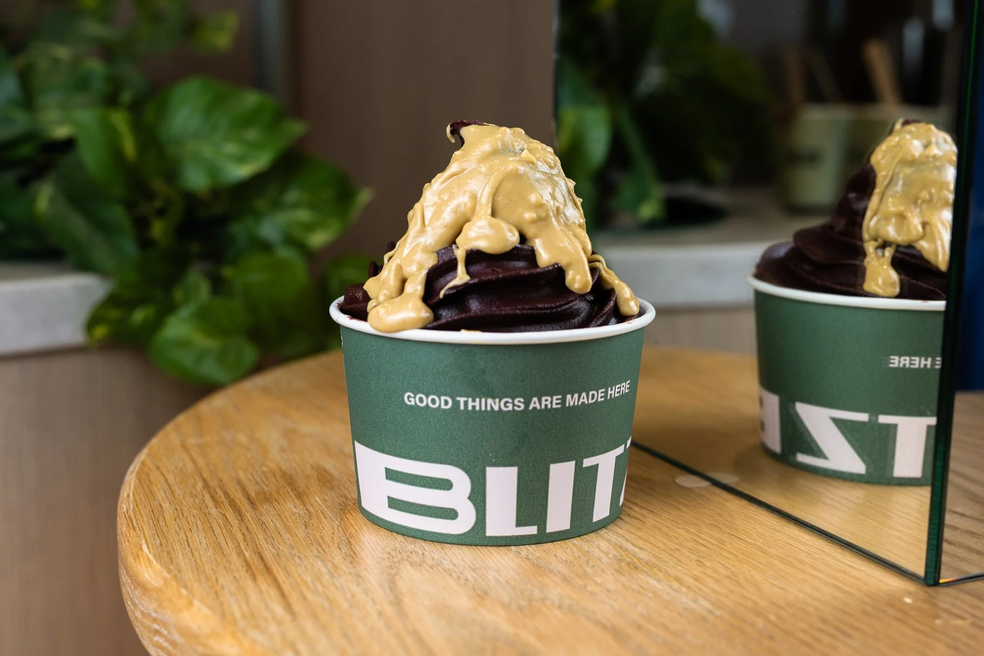 Blitz Bar peanut butter on a chocolate acai cup in a Blitz Bar store in Melbourne
