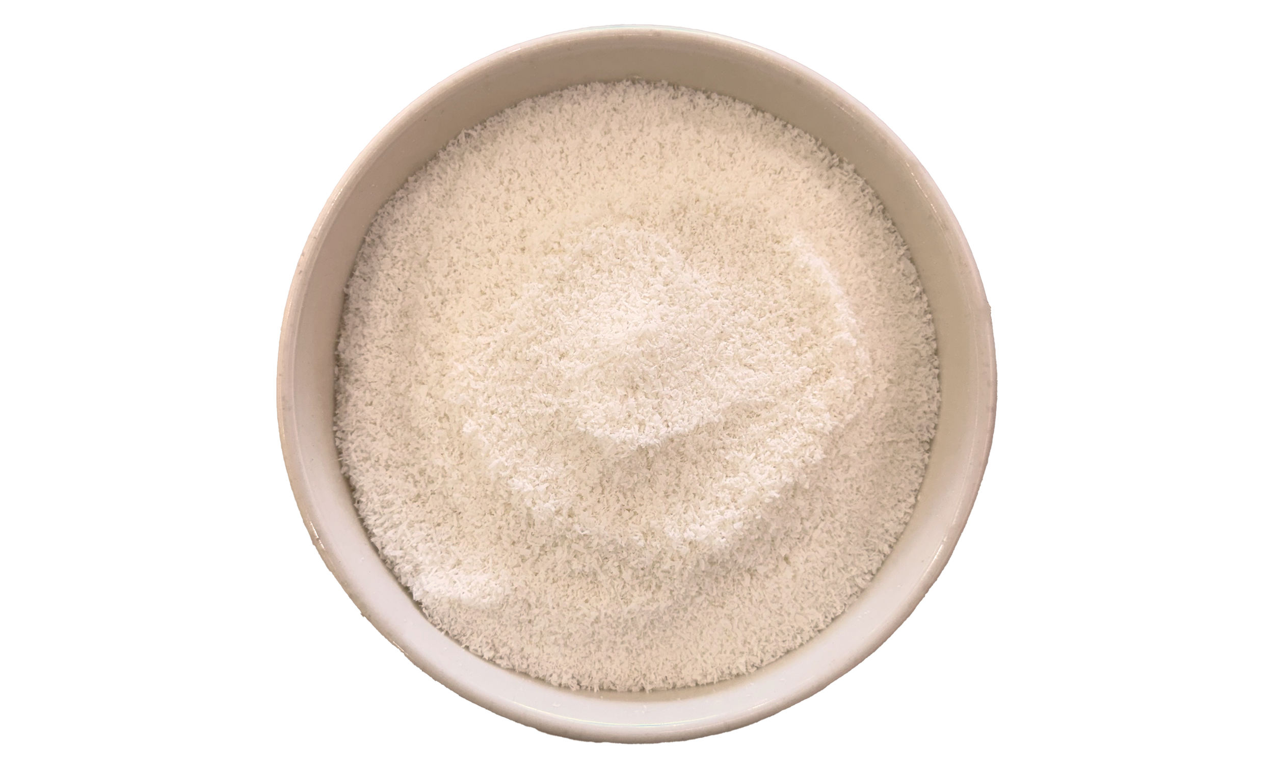 A white bowl filled with shredded coconut.