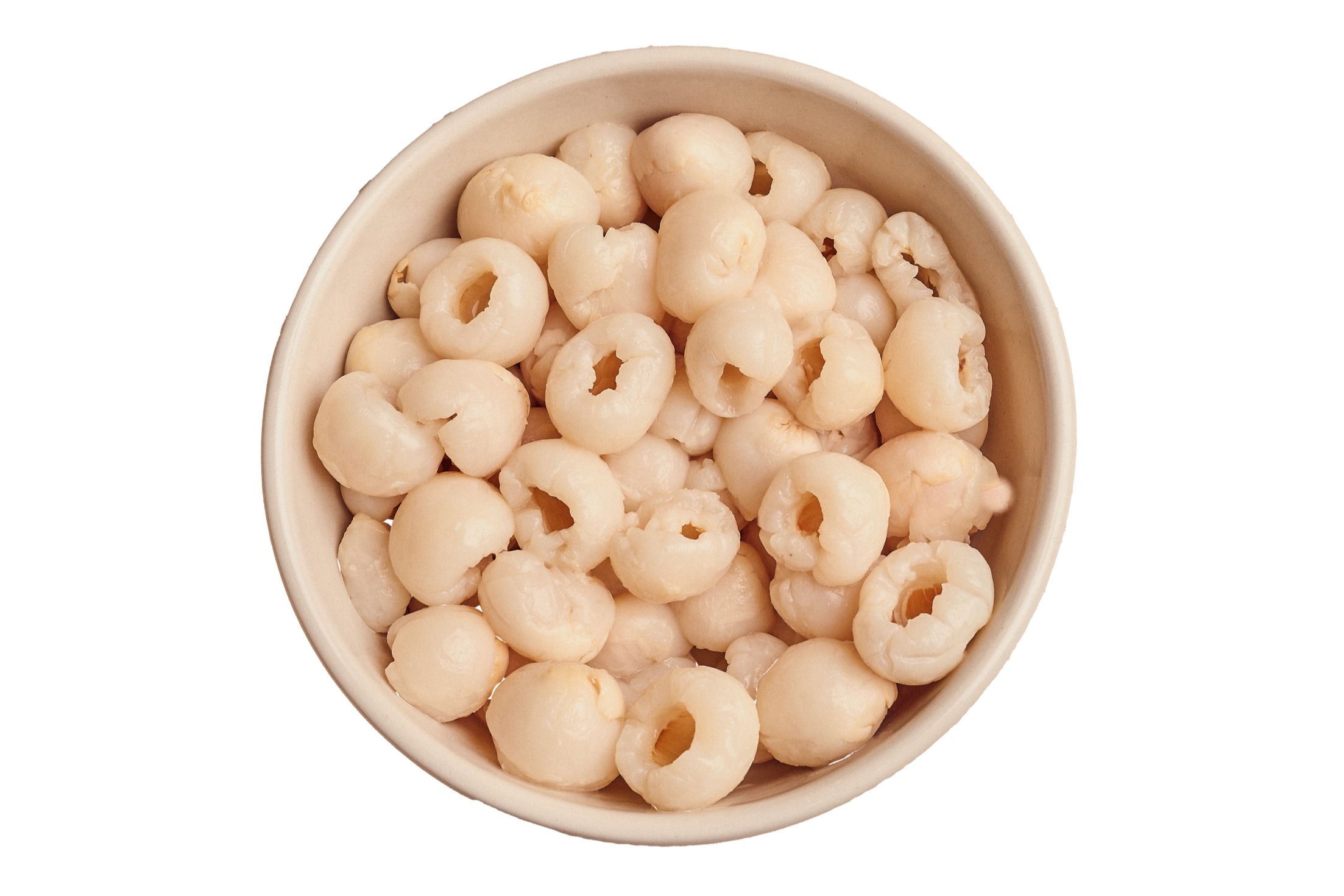White ceramic bowl filled with canned sliced hearts of palm.
