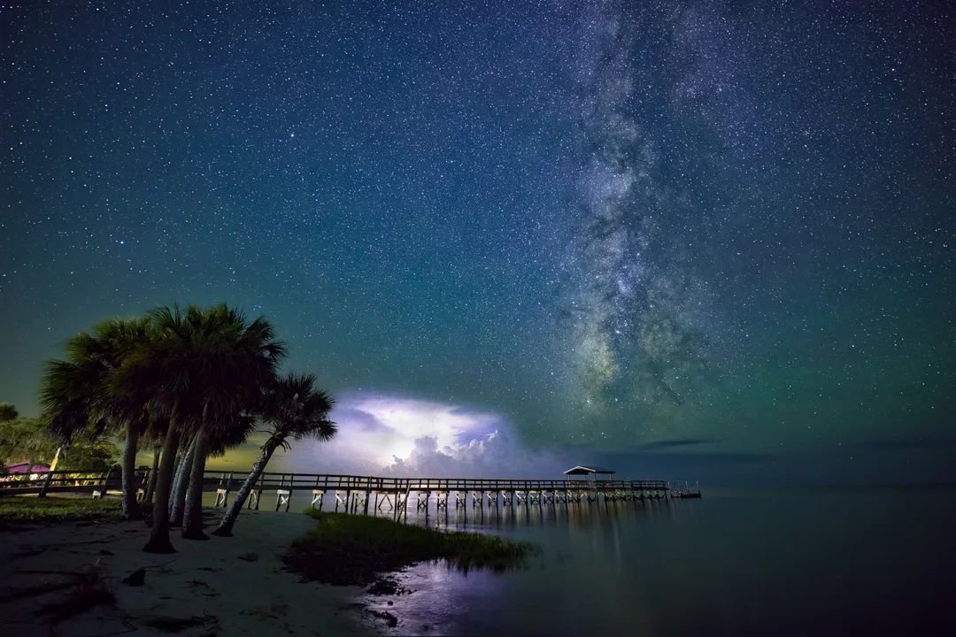 Milky Way season is starting to wind down so I'm trying to find more unique locations. This one turned out to be great and the lightning wanted to join in again as well, and I'm not mad about that at all!

| Nikon Z9 | Nikon 14-24 f/2.8 |

9 stacked 