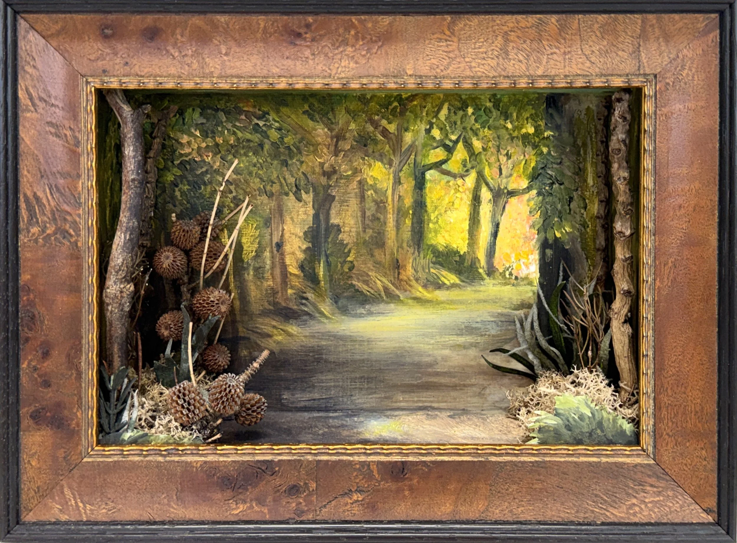 'Freedom is a Clearing in the Forest' ll. (Diorama) Oil paint, found objects, artificial foliage, painted car cut-outs on cardboard boxes set in custom frame. H 20cm x W 25cm x D 6cm. 2026