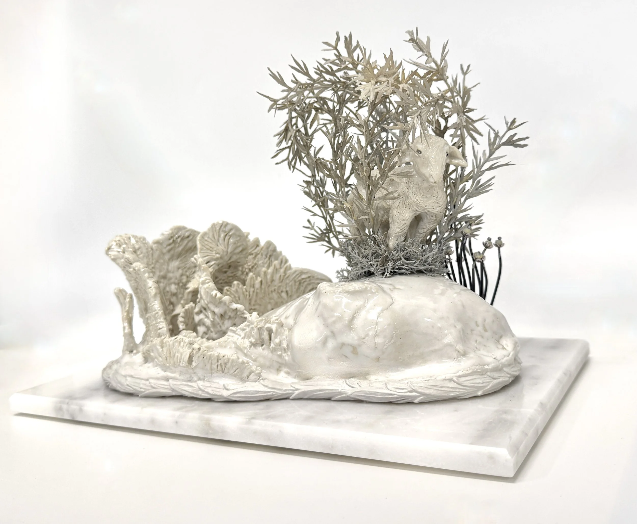 'Who let the dogmas out?' Glazed stoneware, painted composite wood, artificial foliage, steel wire, silver thread, beads and bead-cpas on marble. H 22cm x W 30cm x D 20cm.