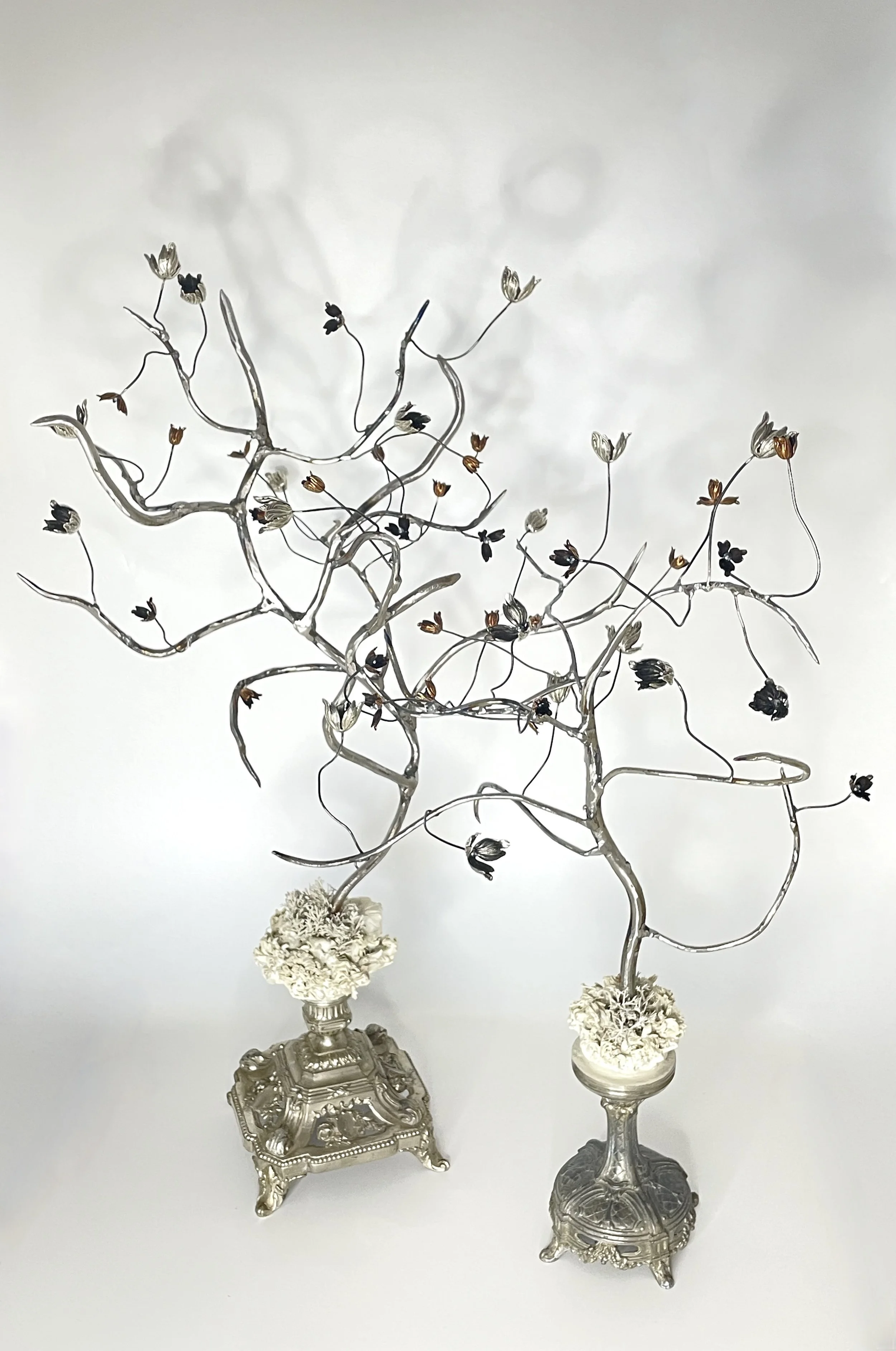 Glazed stoneware, artificial leaves, acrylic paint, metal bead-caps, welded steel and bead-caps on readymade/found vintage base.