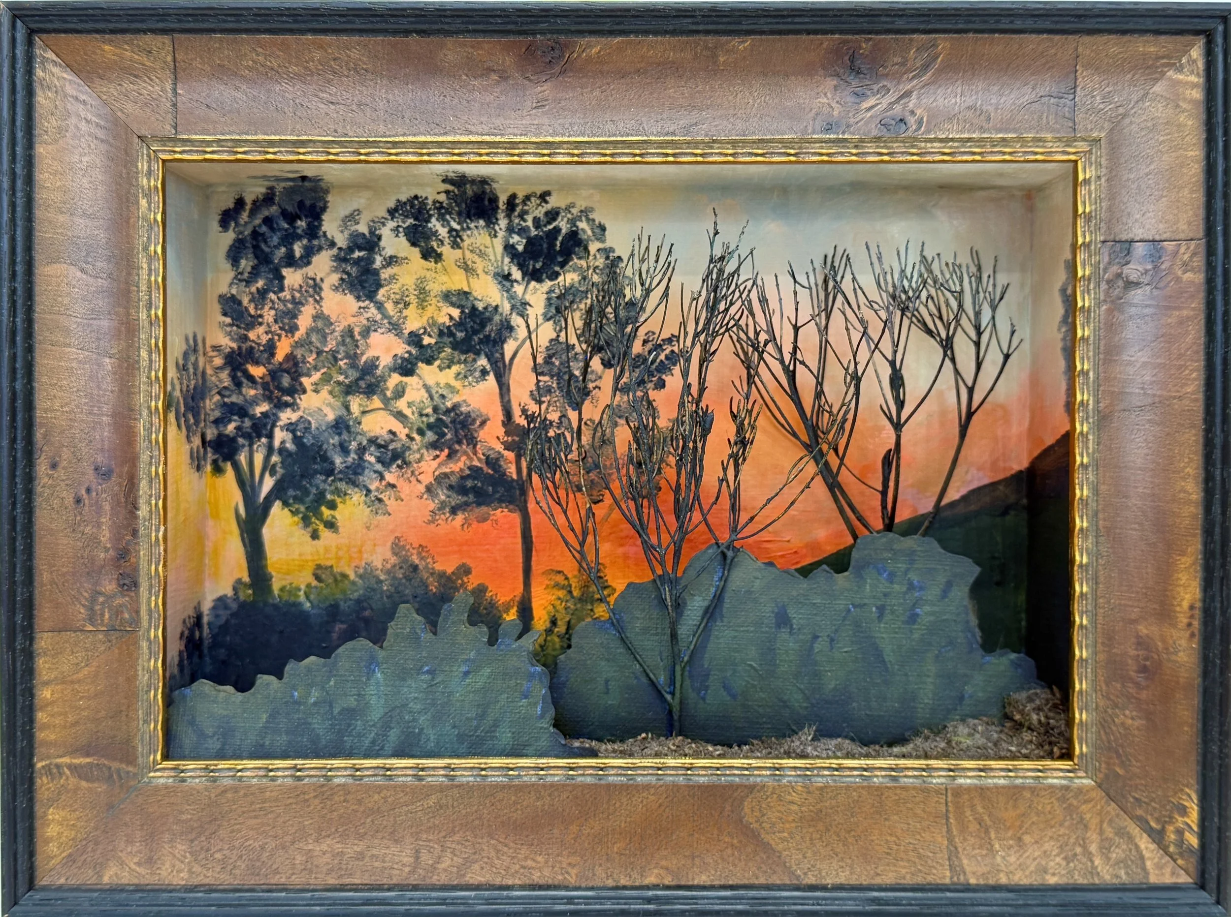 'Freedom is a Clearing in the Forest' V. (Diorama) Oil paint, found objects, artificial foliage, painted car cut-outs on cardboard boxes set in custom frame. H 20cm x W 25cm x D 6cm. 2026