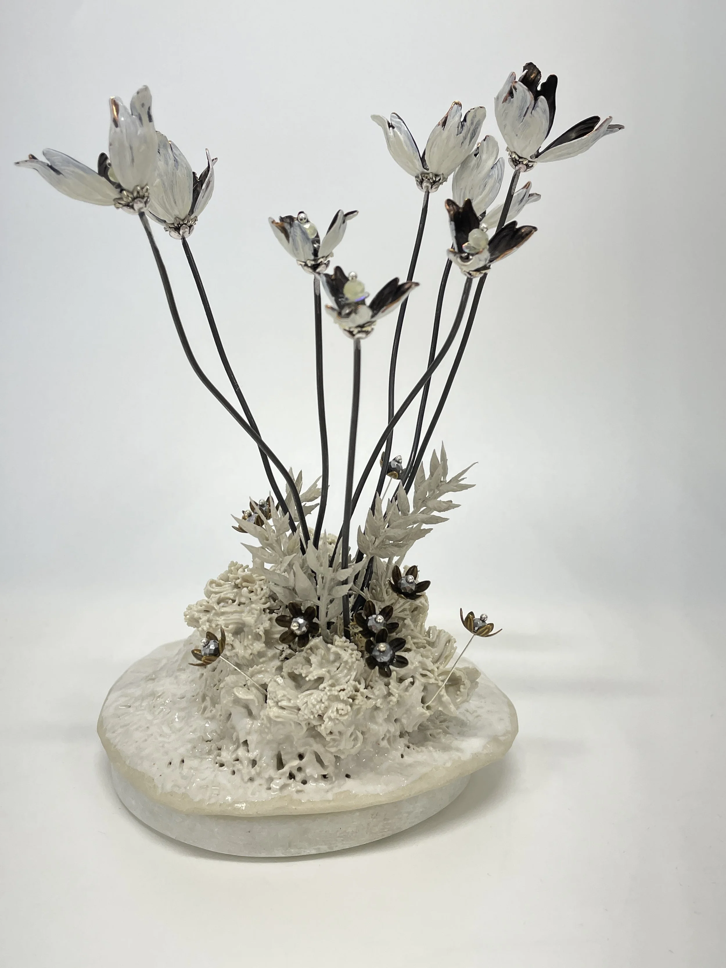 Glazed stoneware, artificial leaves, acrylic paint, metal bead-caps, steel, sequins and beads on marble.