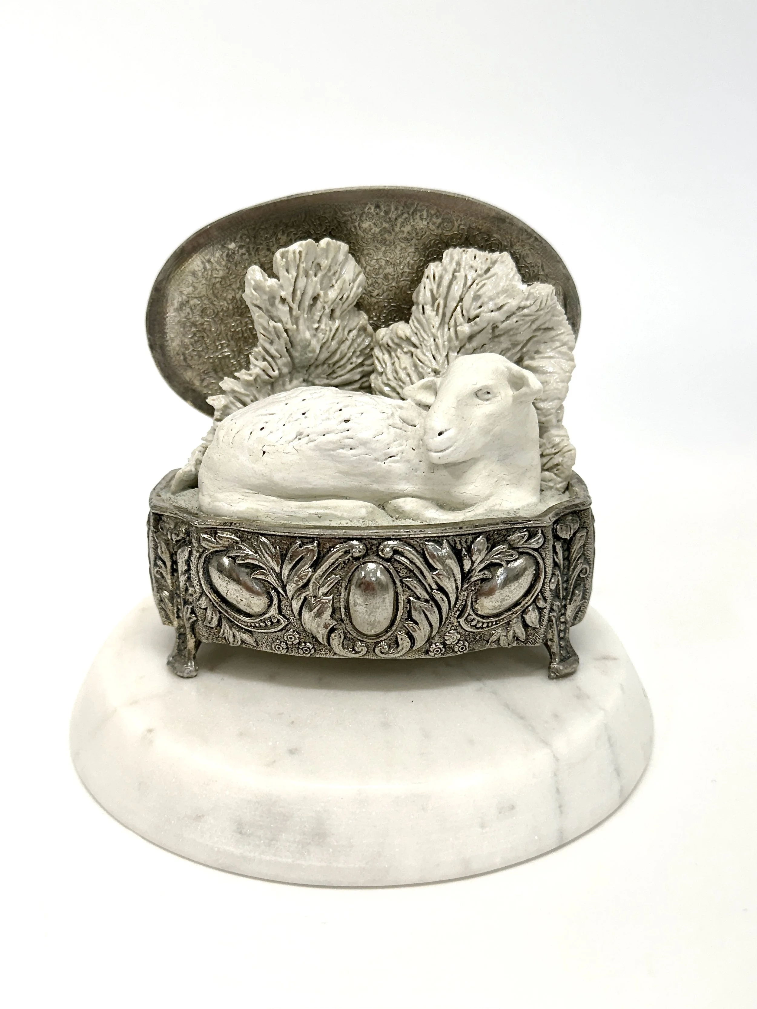 'Open me carefully' Glazed stoneware, acrylic paint on cement in metal vintage jewellery box on marble base. H 11cm x W 12cm x D 12cm.