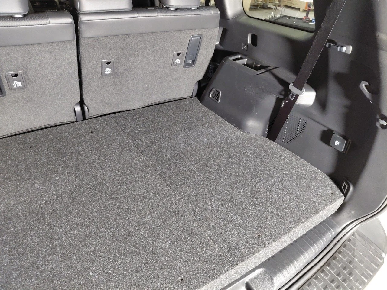 Top-down view of flat platform installed showing clearance over hybrid battery