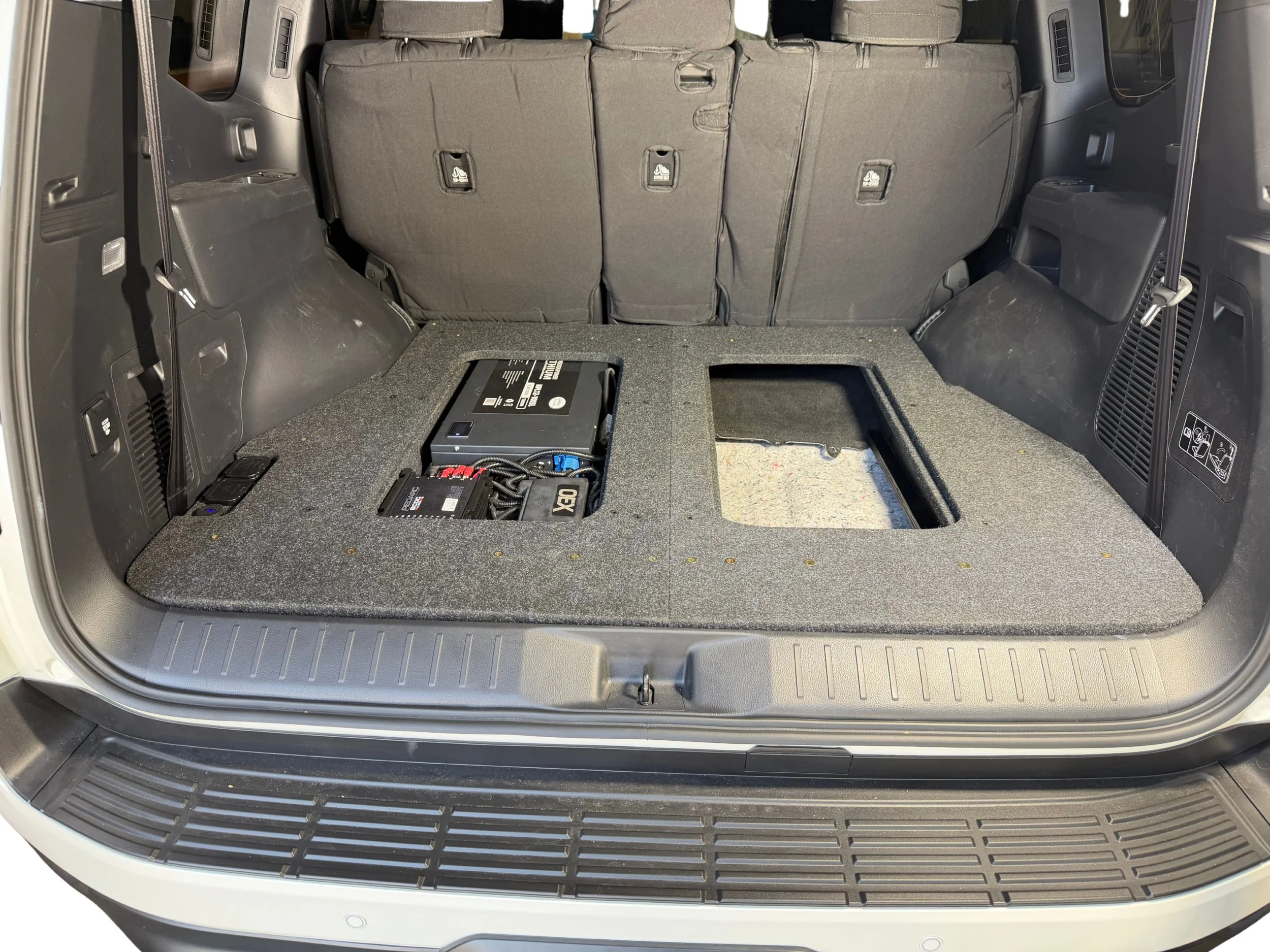 Landcruiser 300 series PowerDeck false floor with lithium battery.jpg
