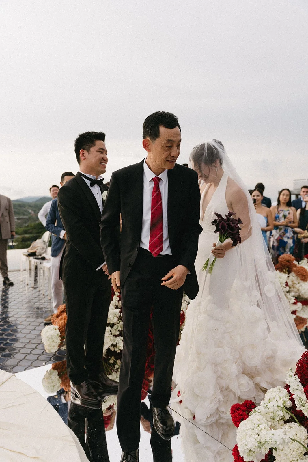bride and groom meeting at ceremony location at sri panwa