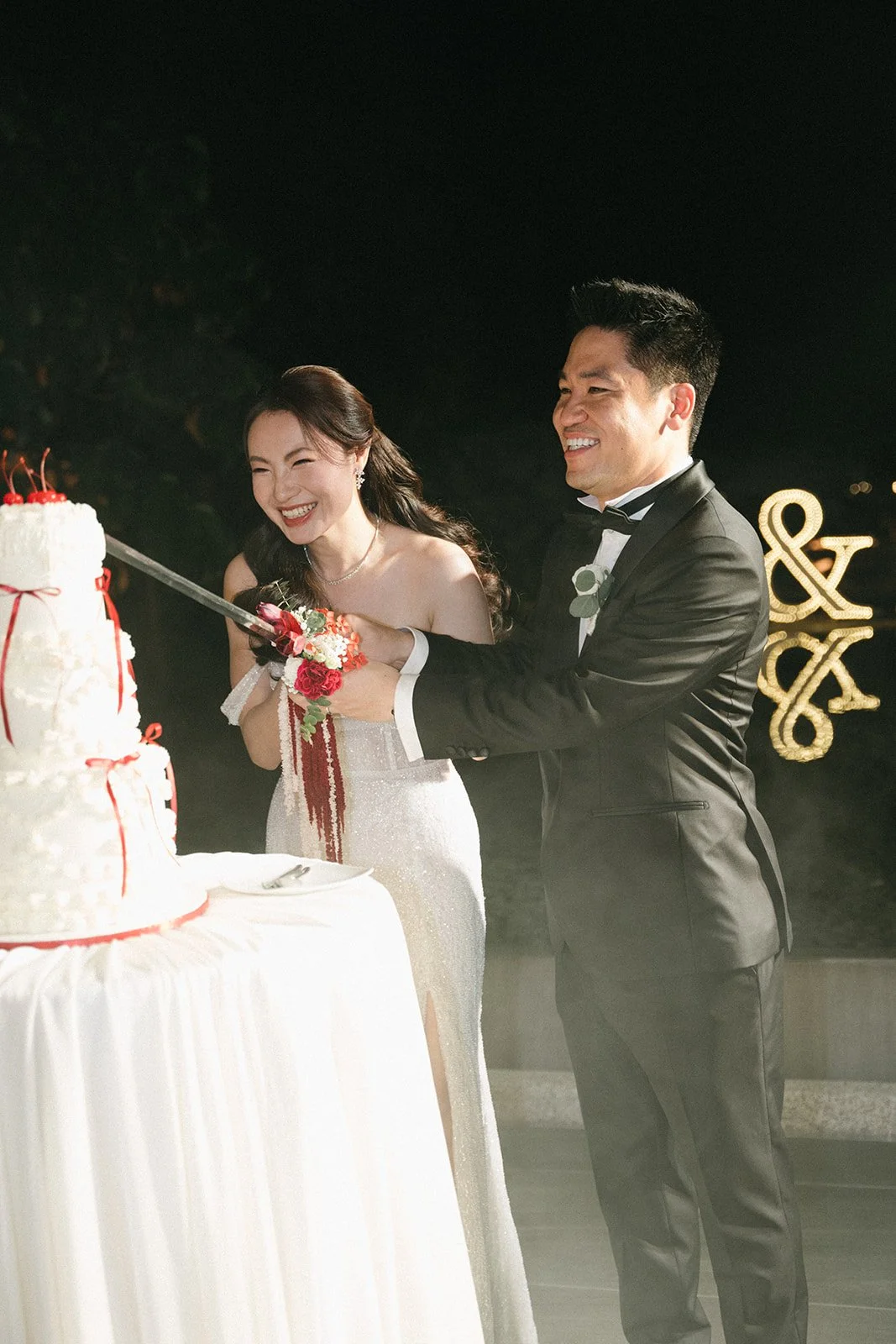 Wedding cake cutting at reception