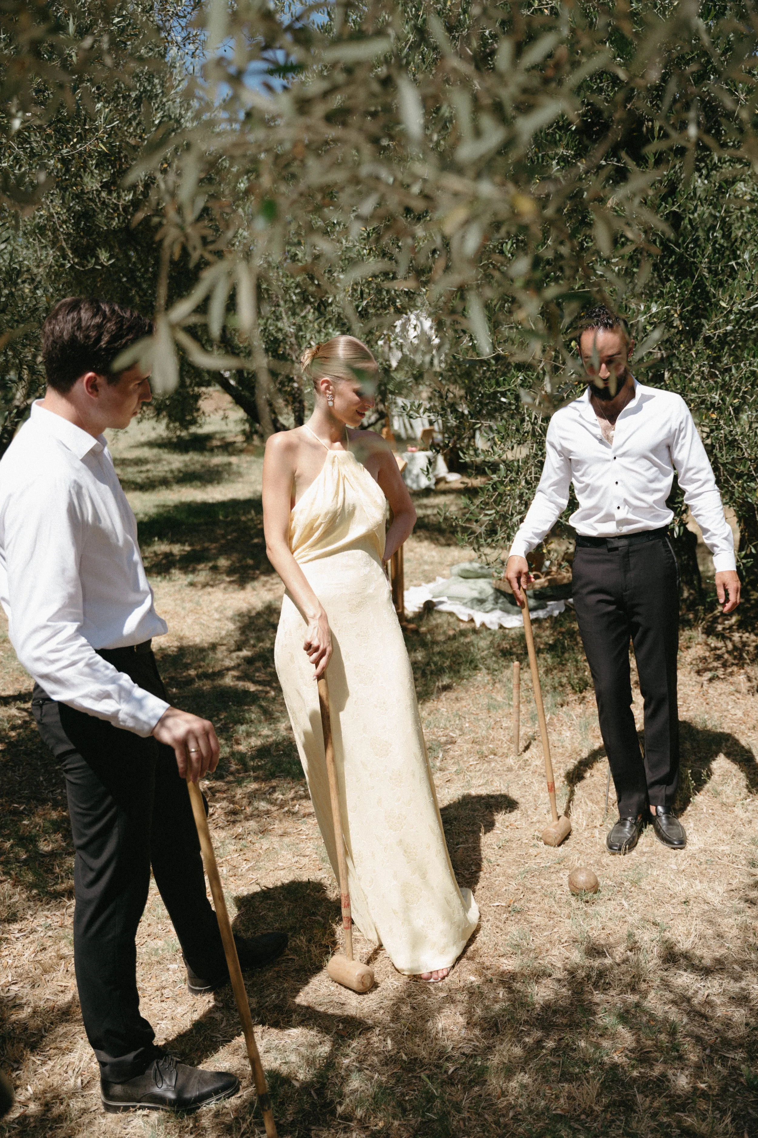 Wedding guests playing traditional Italian games during Villa Cozzano destination wedding