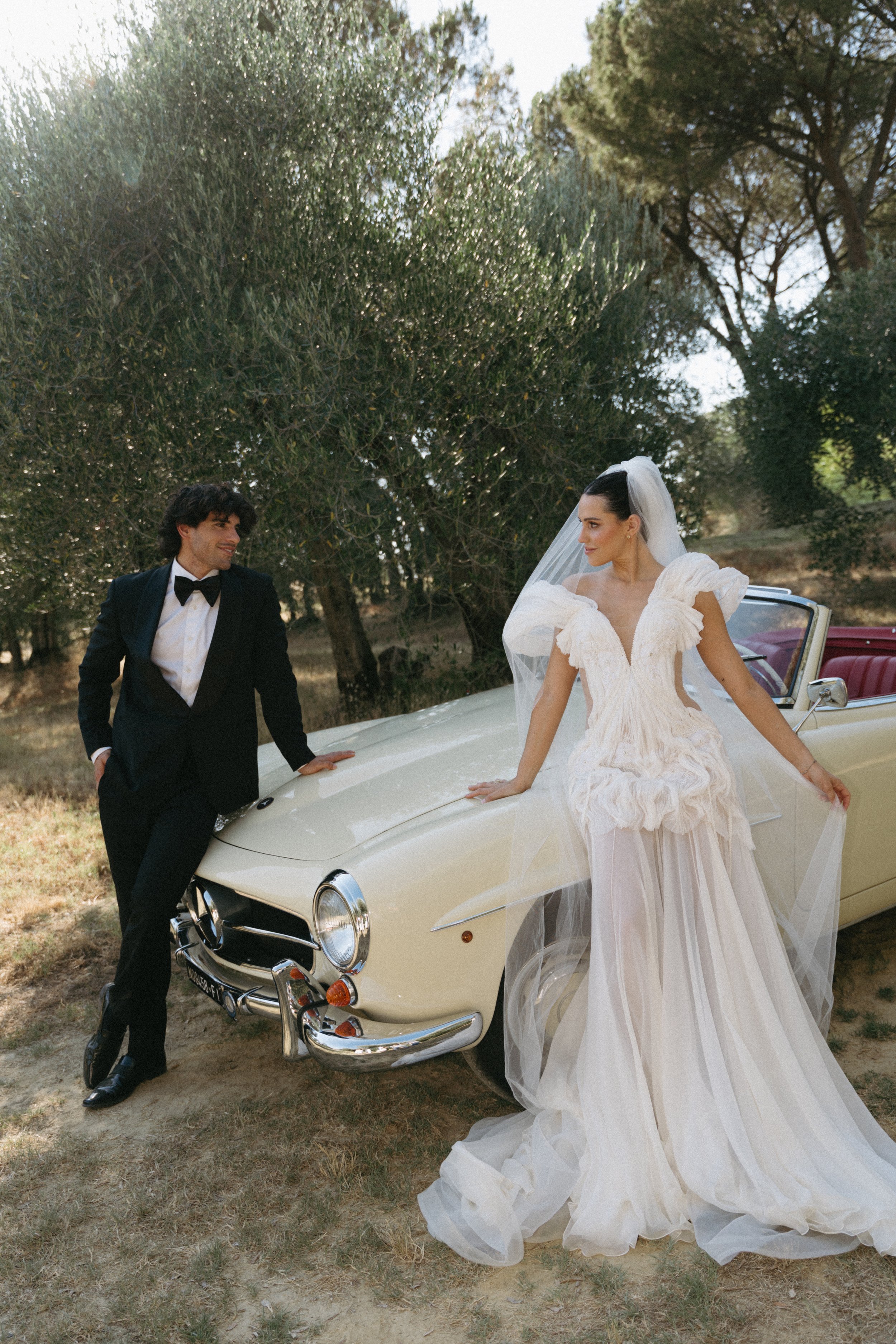 Couple portraits in golden hour light at Villa Cozzano Tuscany wedding editorial