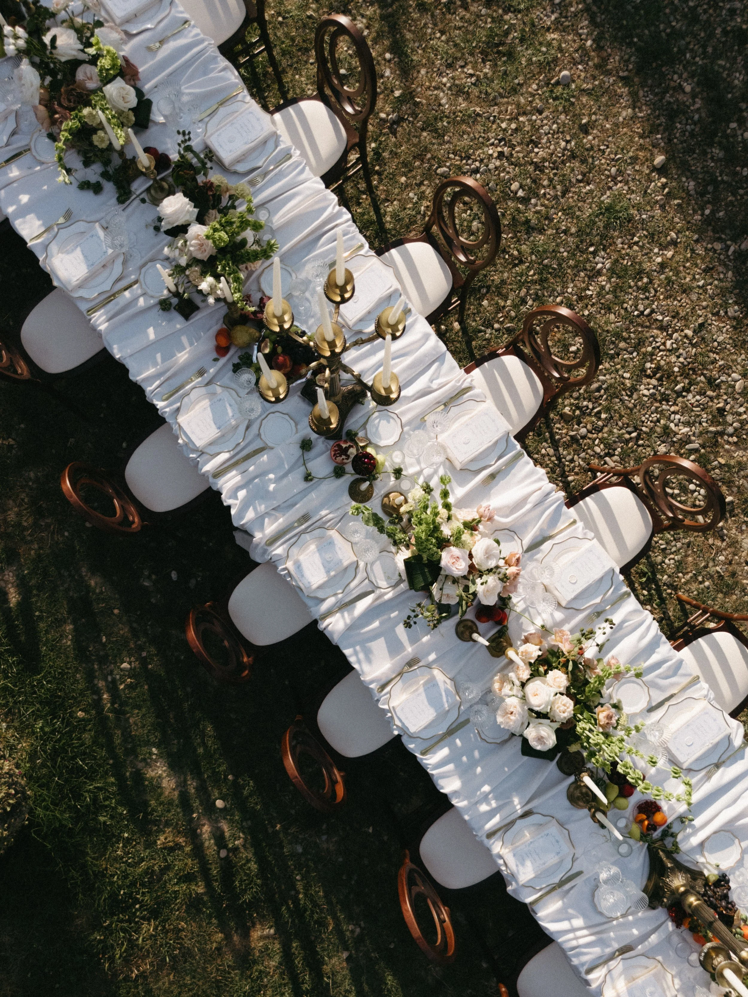Tuscany micro wedding reception setup with neutral tones, greenery, and villa garden backdrop