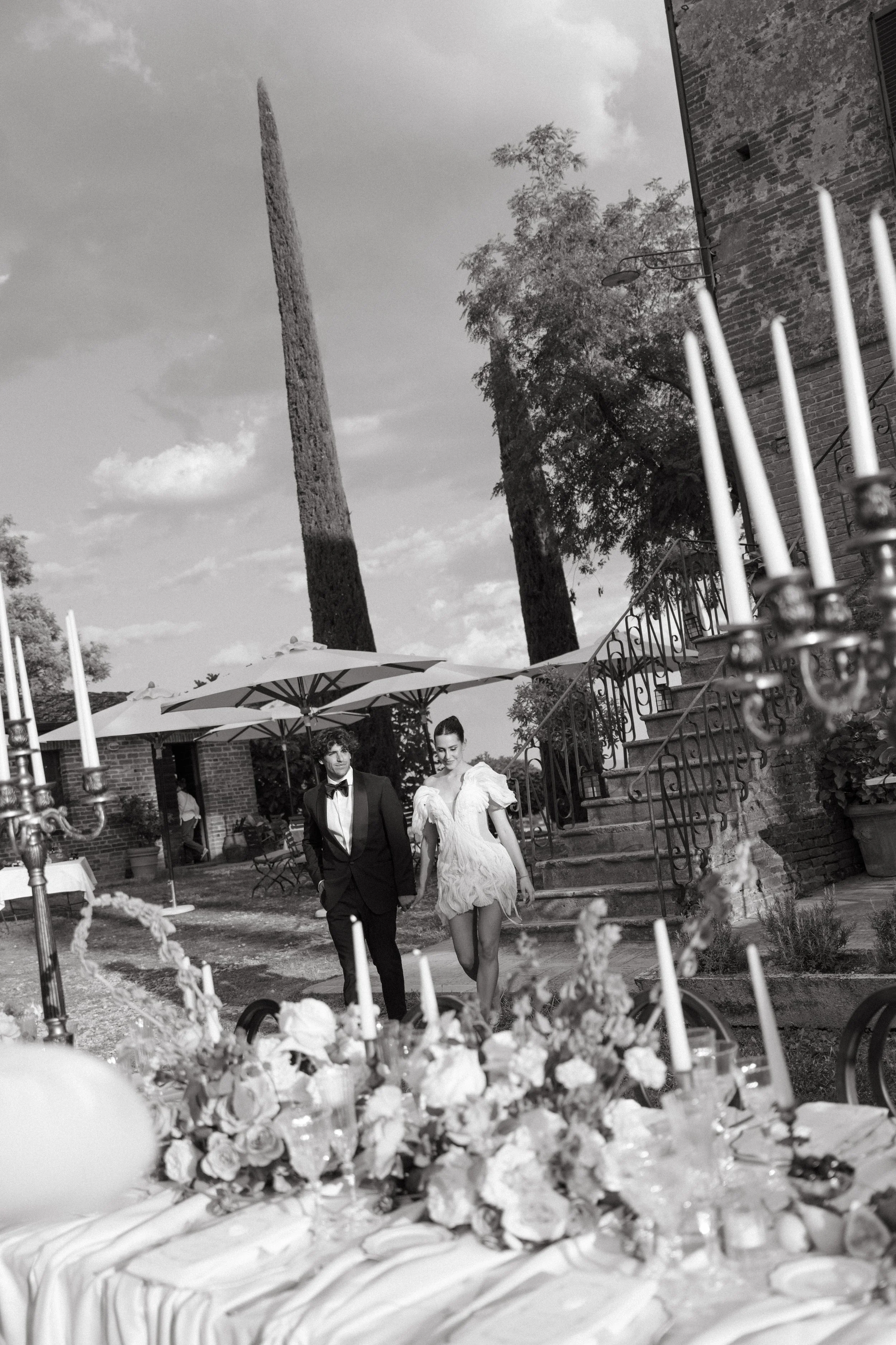 bride and groom arriving at intimate destination wedding reception at villa cozzano