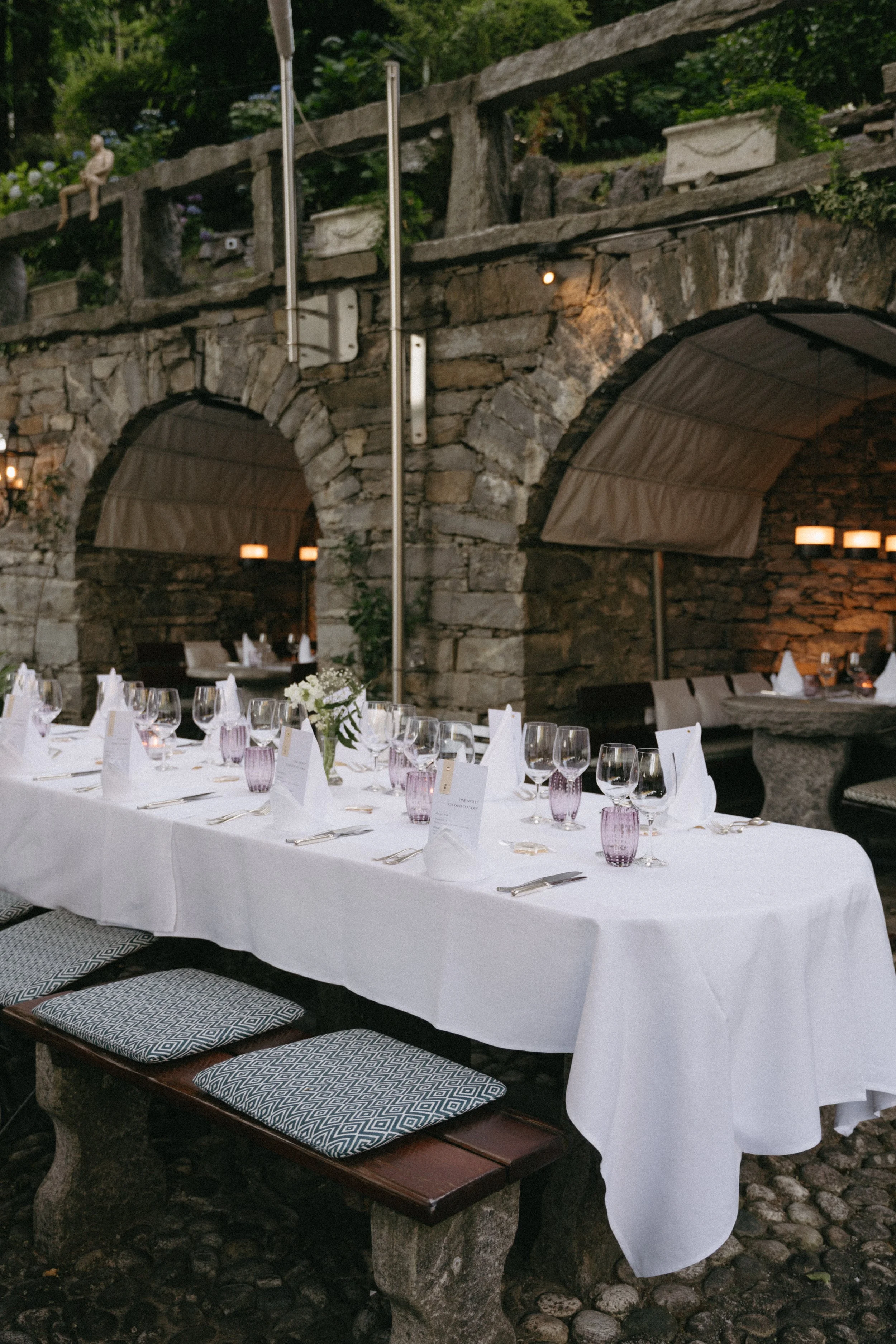 Rustic outdoor terrace setting at Ristorante Da Enzo in Tegna, Switzerland