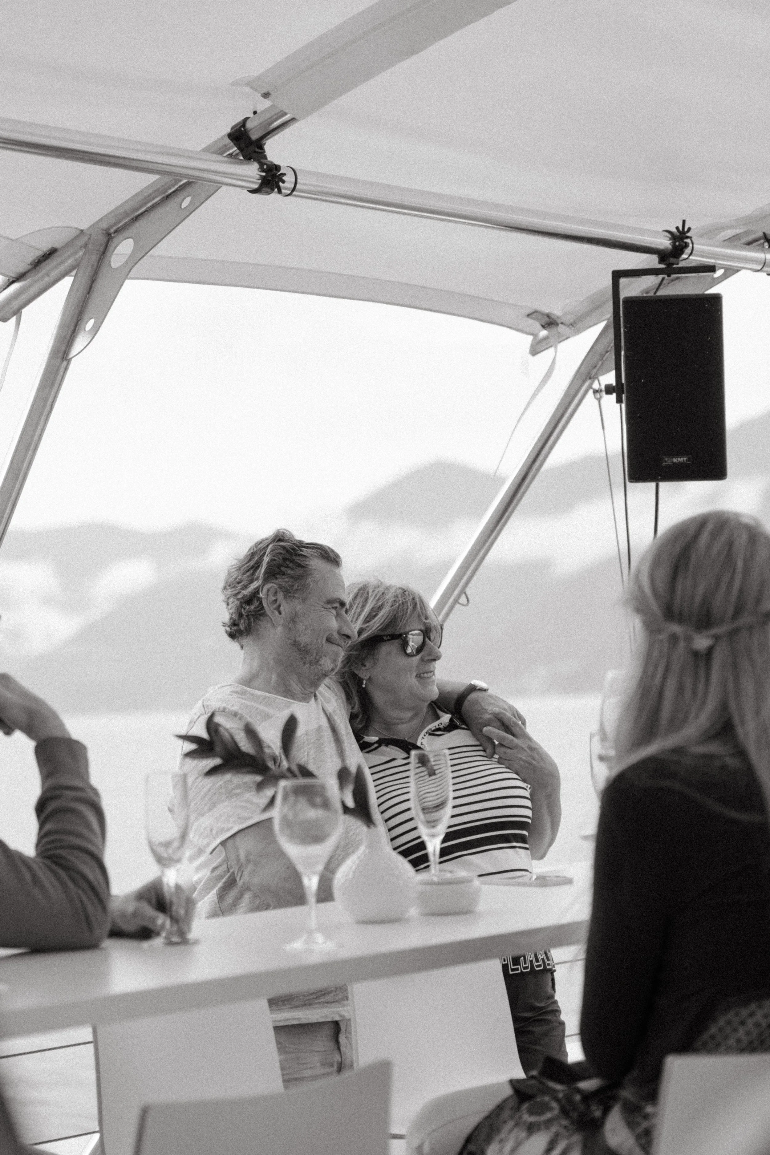 Documentary-style photo of guests relaxing on the boat