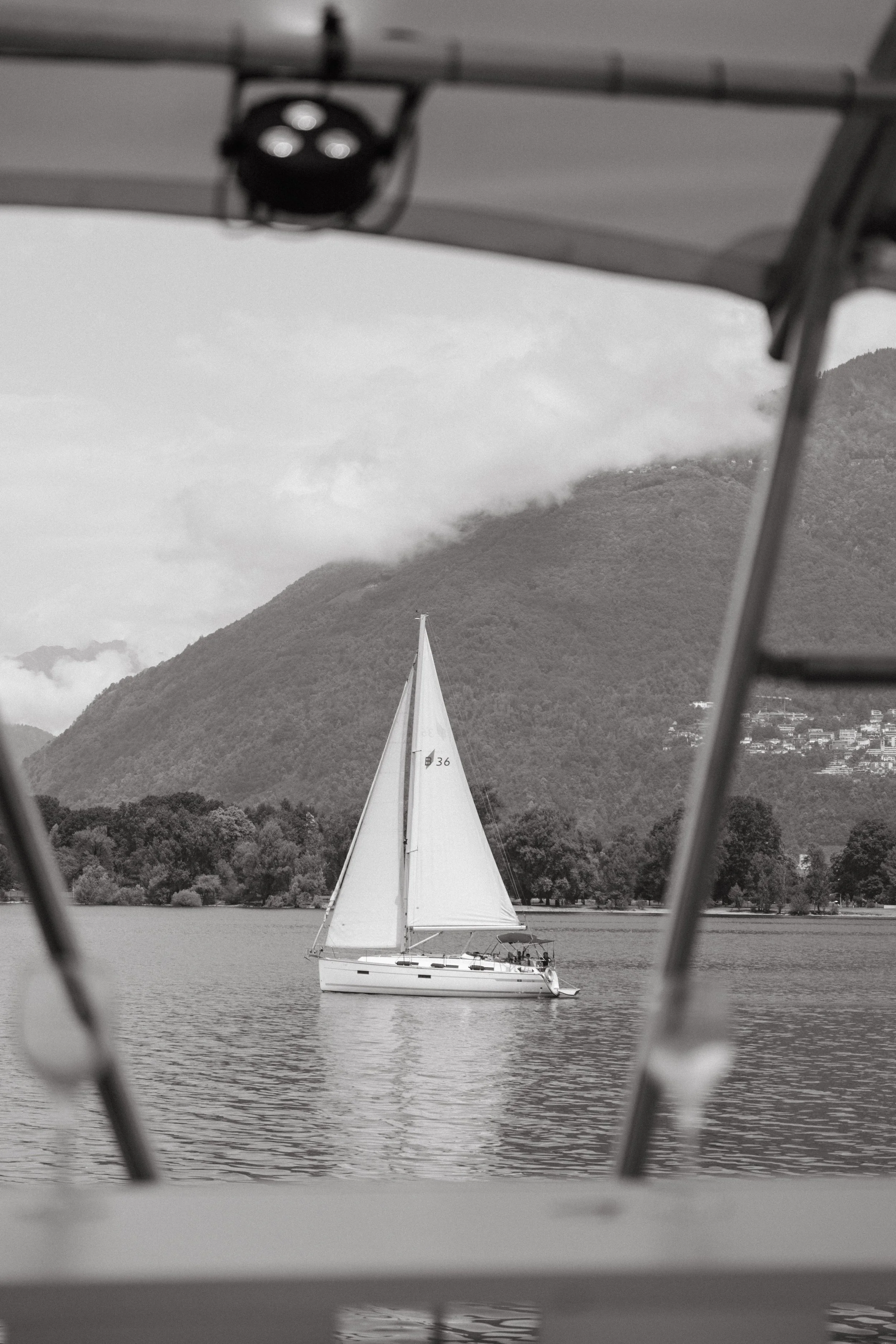 black and white portrait of another boat nearby