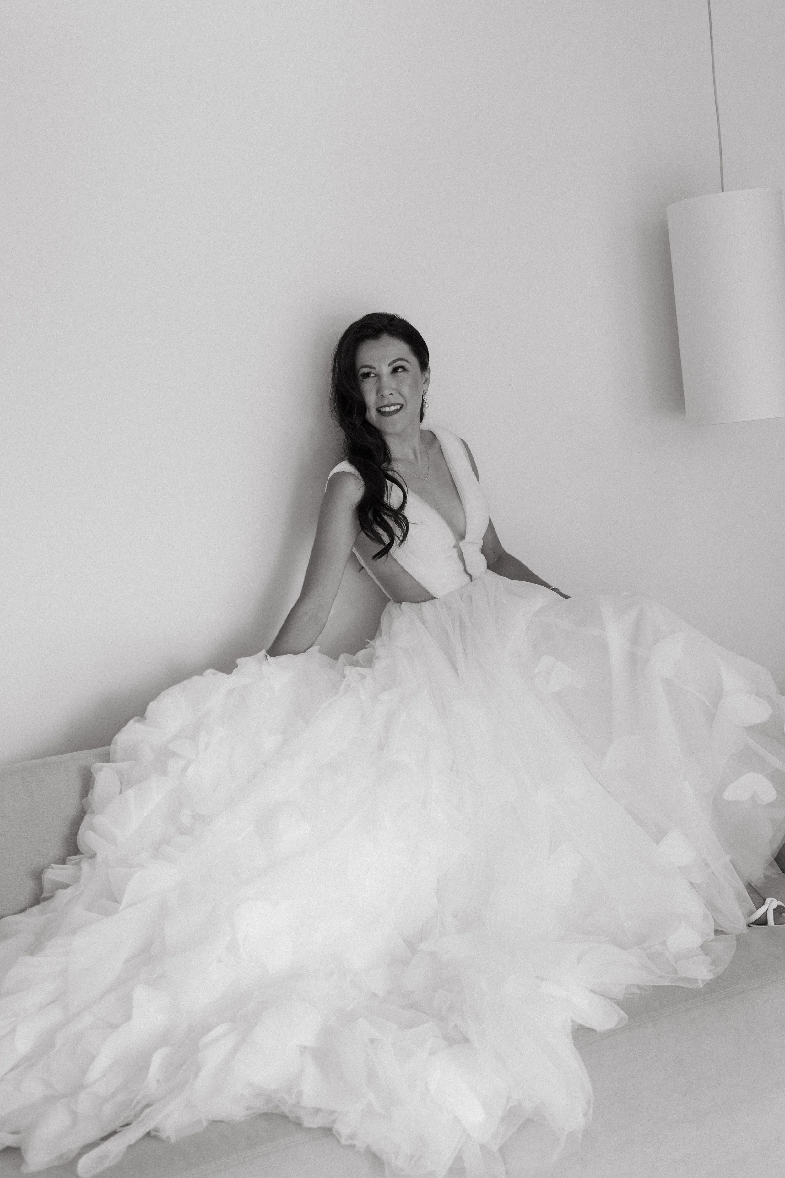elegant portrait of the bride as she gets ready for the wedding ceremony