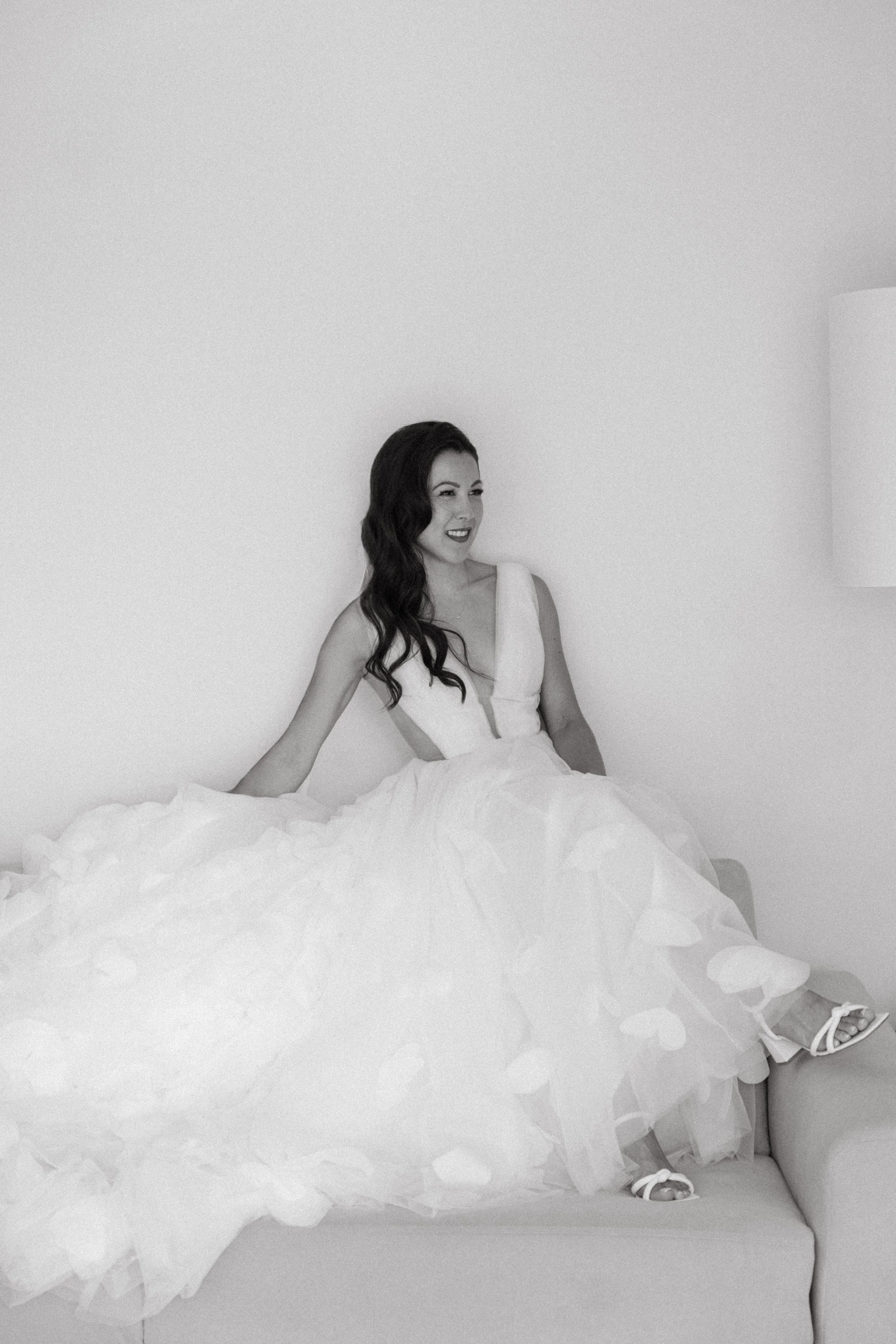 elegant portrait of the bride as she gets ready for the wedding ceremony
