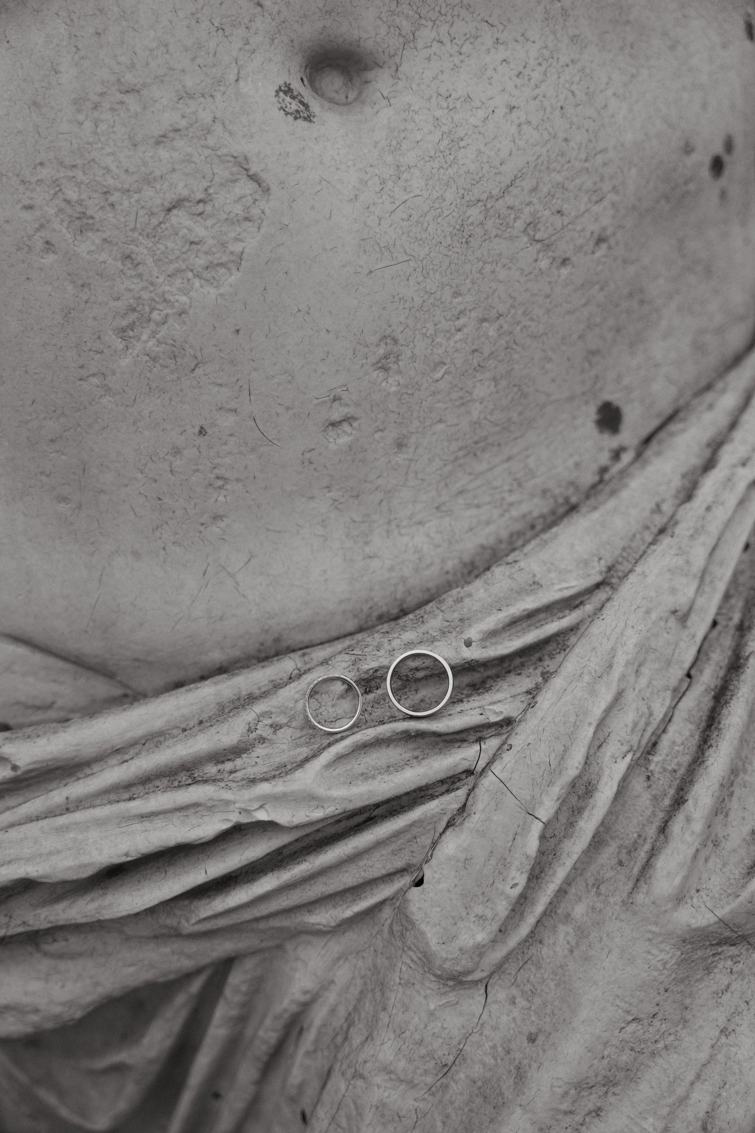 rings placed on statue at Hotel Giardino, Ascona