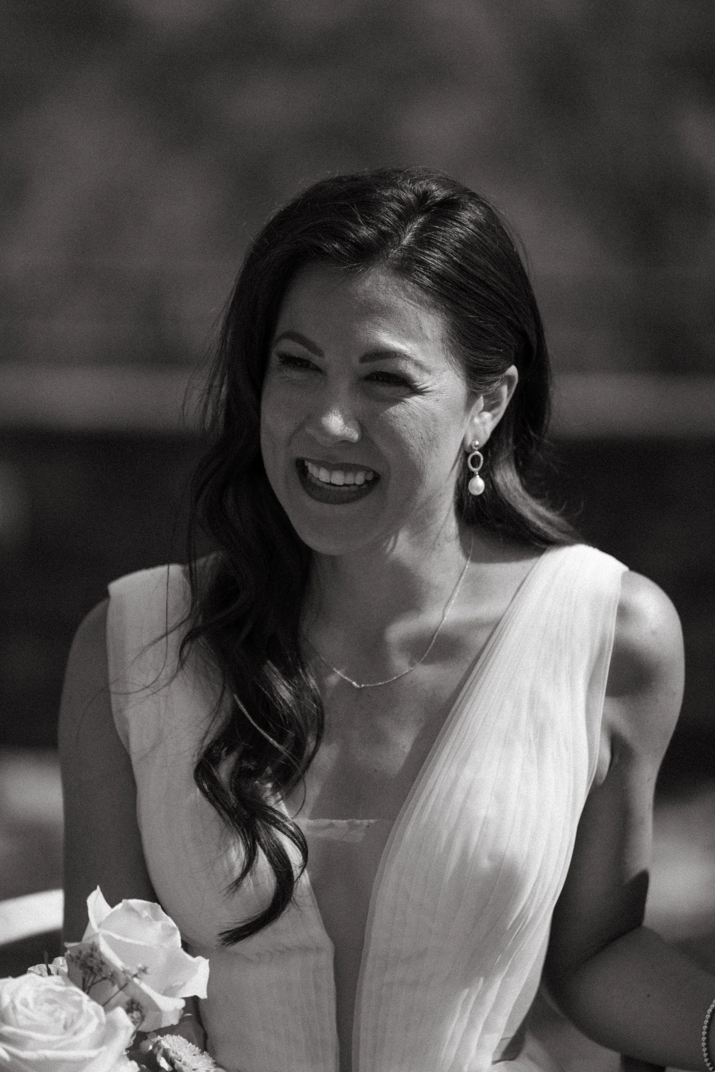 close up portrait of bride smiling during their outdoor ceremony in Ticino