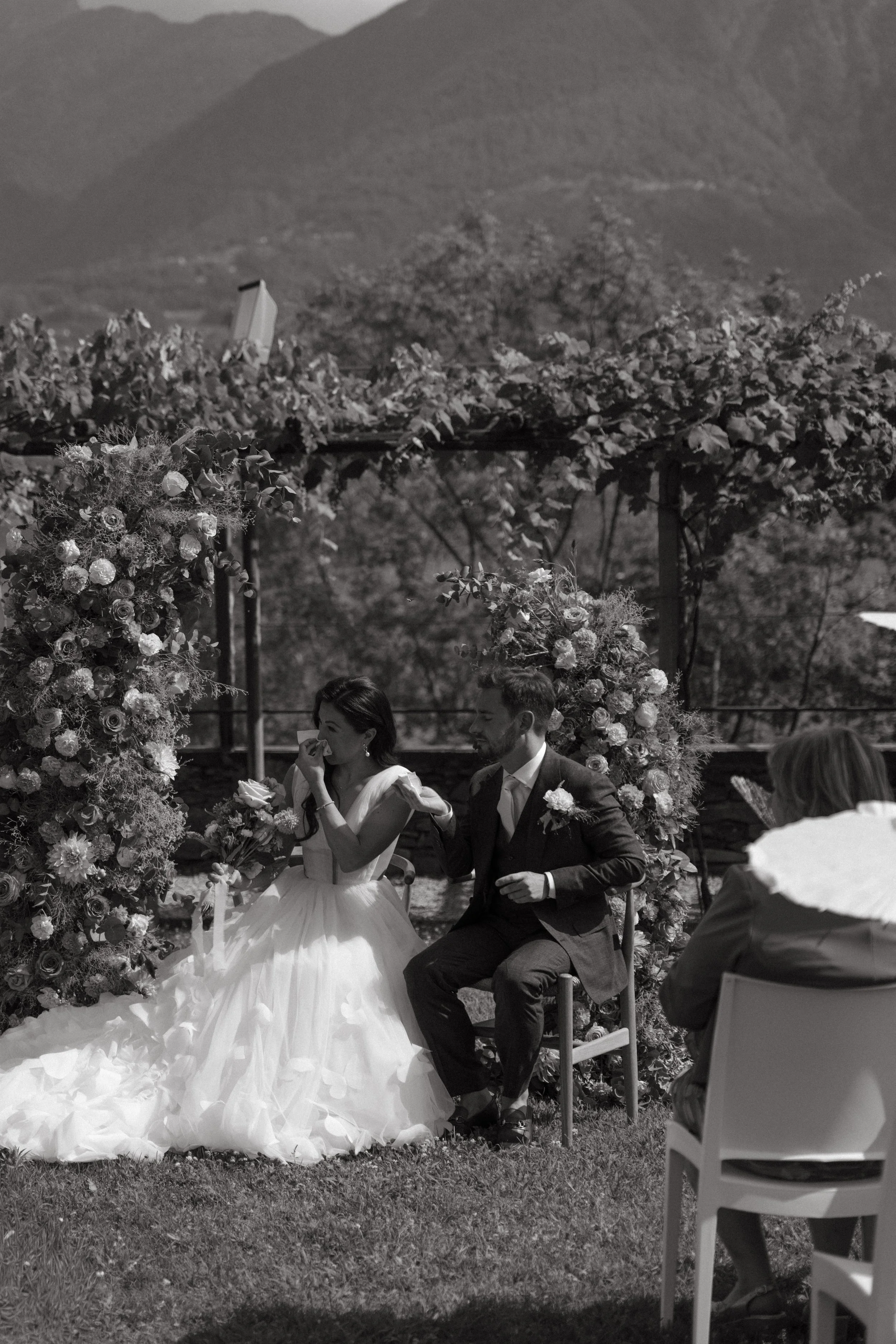 Emotional moment between the couple during their outdoor ceremony in Ticino