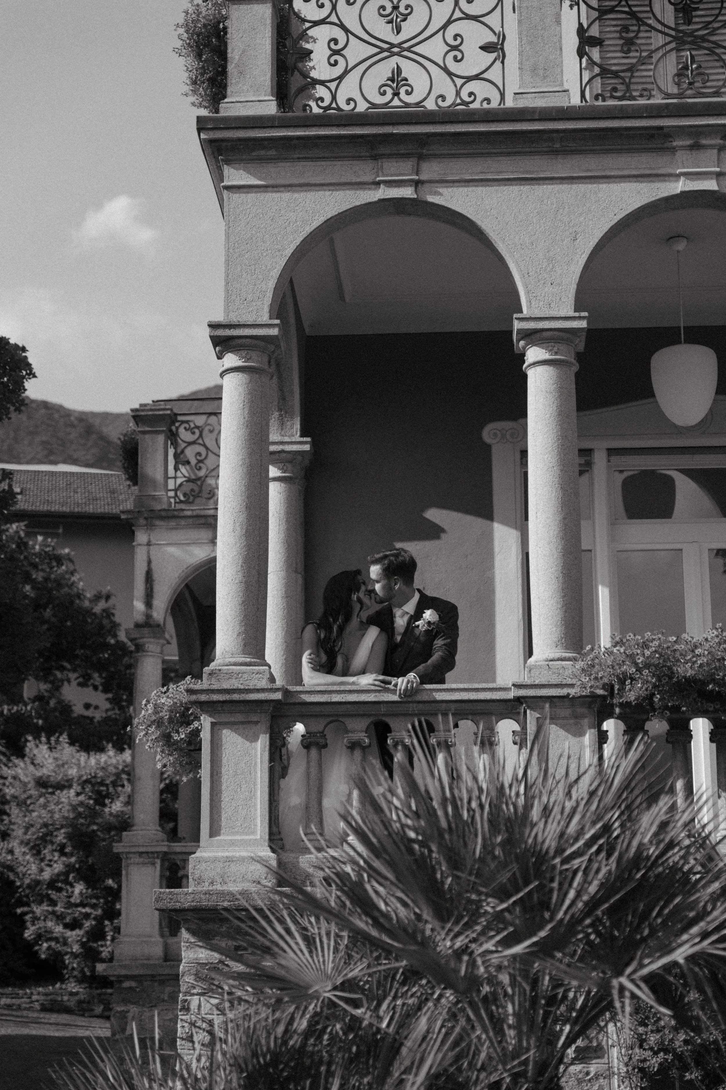 Bride and groom sharing a quiet kiss after their Villa San Quirico ceremony