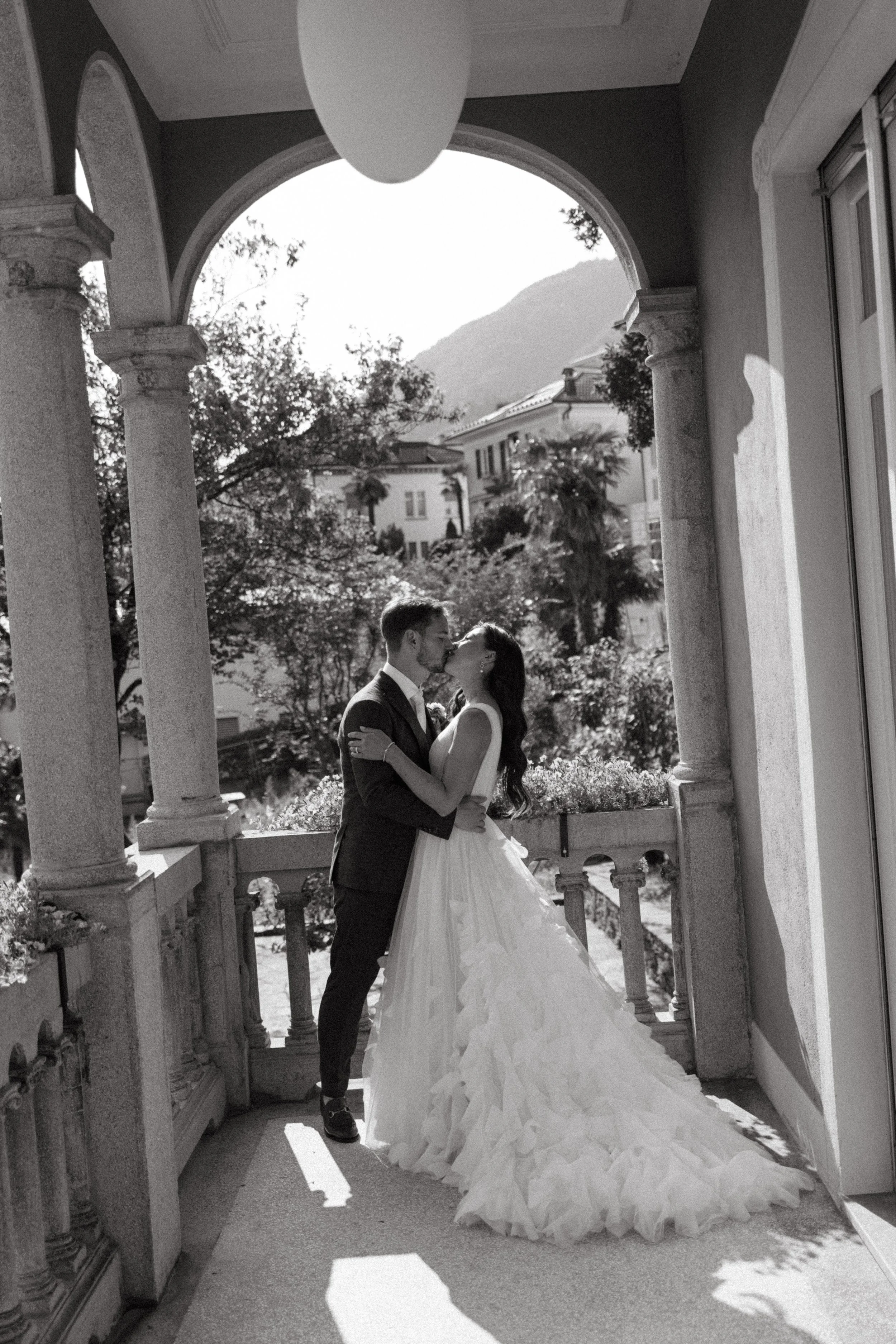 Intimate moment between bride and groom captured at Villa San Quirico