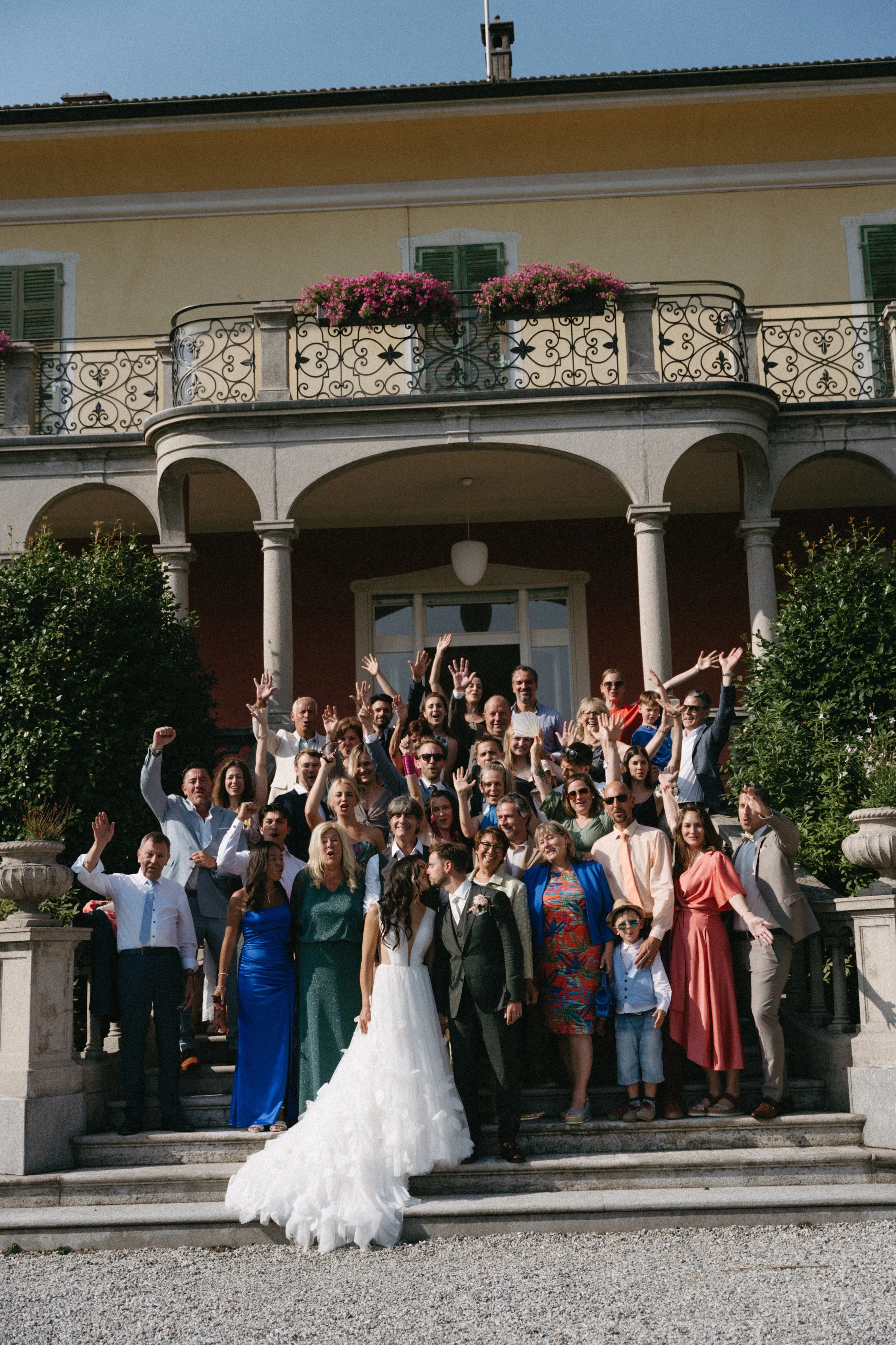 group shot of bride and groom with all their wedding guests after their ceremony at Villa San Quirico in Minusio