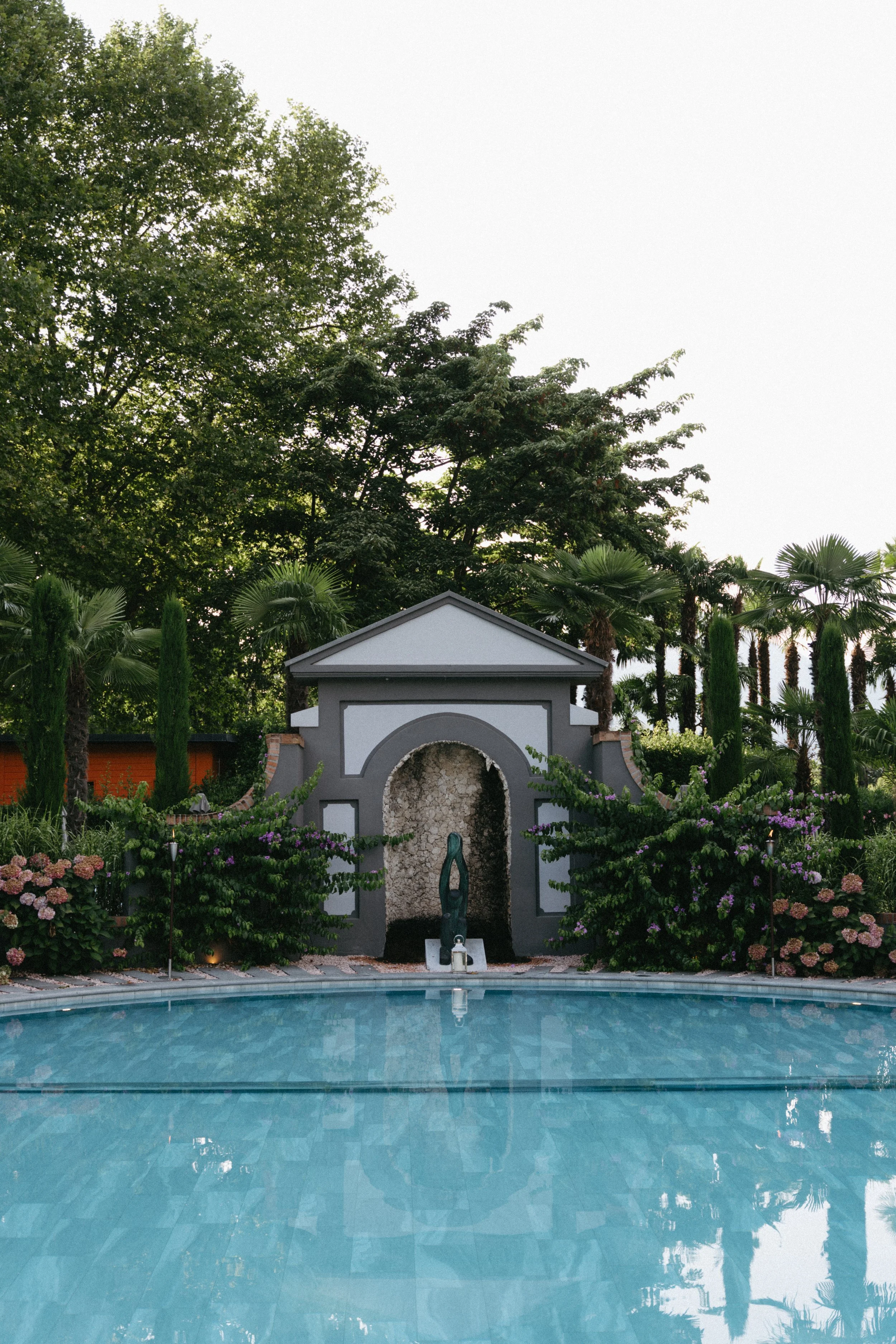 blue outdoor pool at Hotel Giardino in Ascona, Switzerland