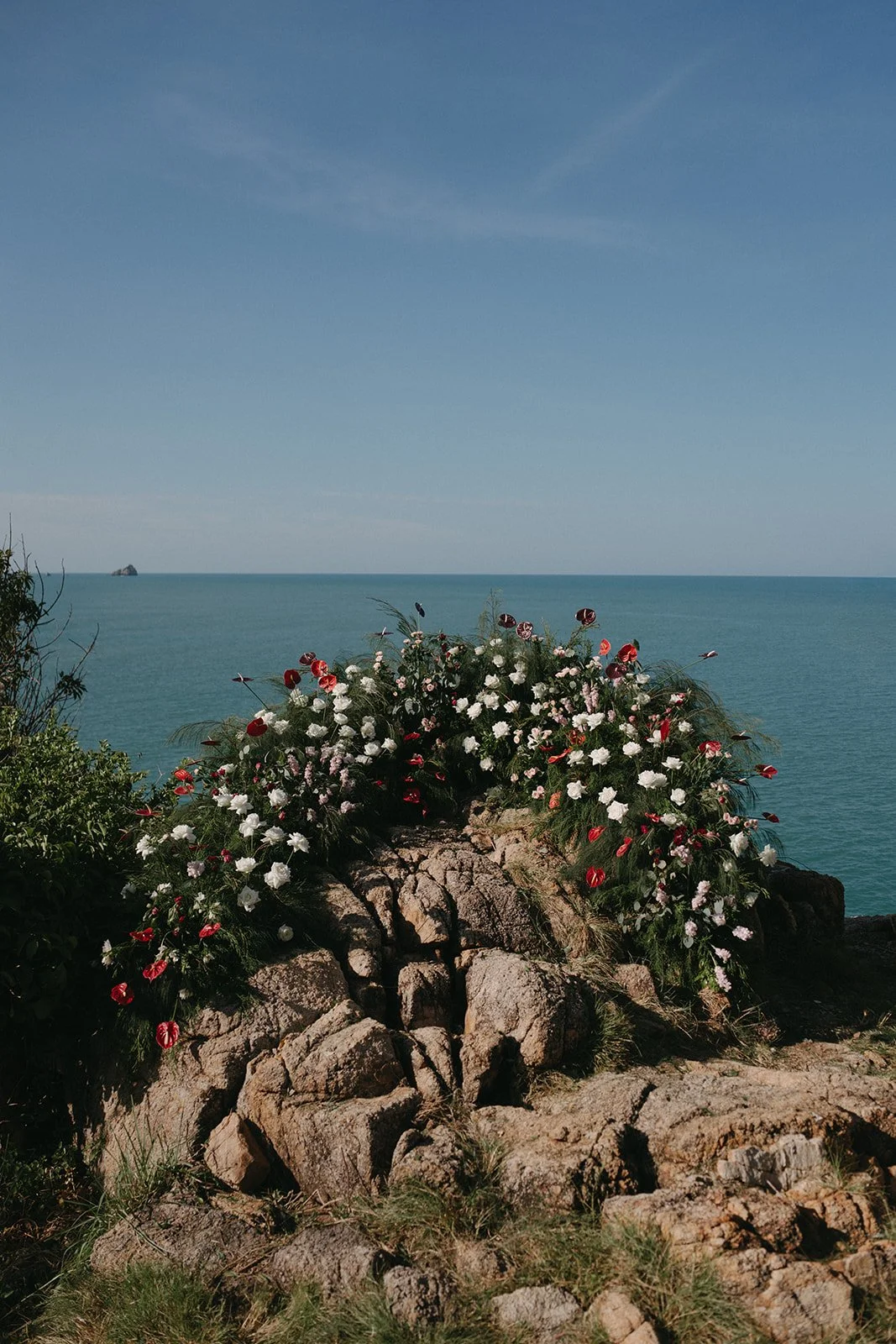 organic floral setup for destination wedding ceremony at cape fahn