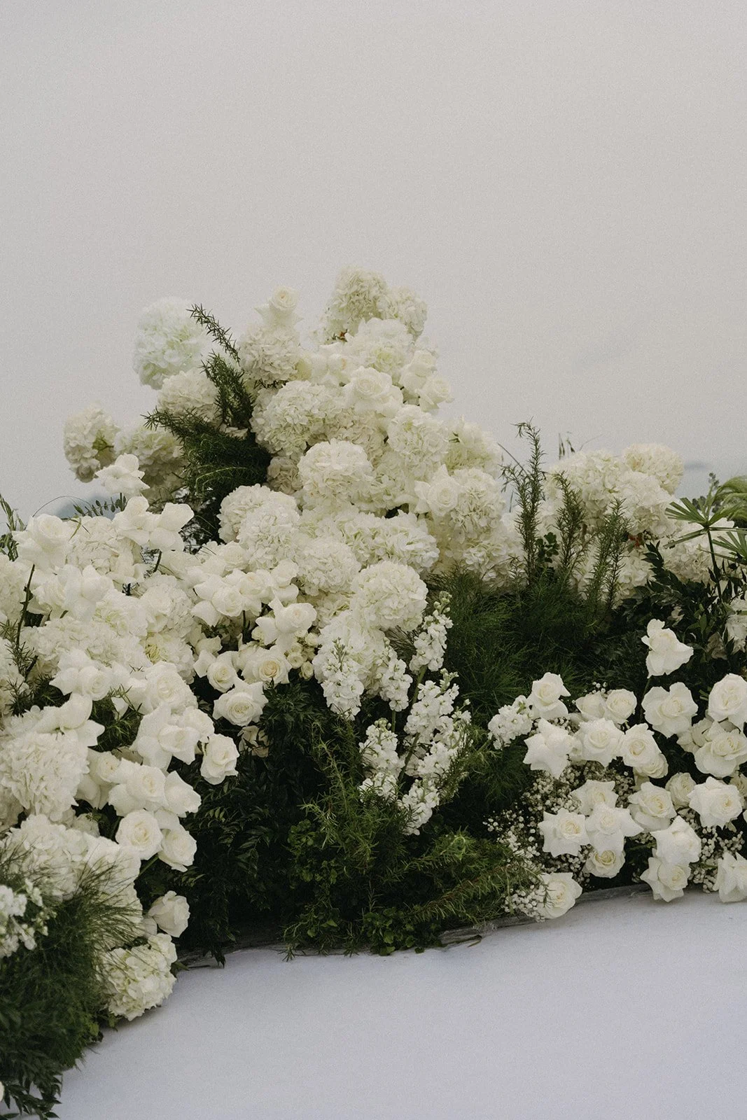 stunning white floral arrangement for luxury destination wedding