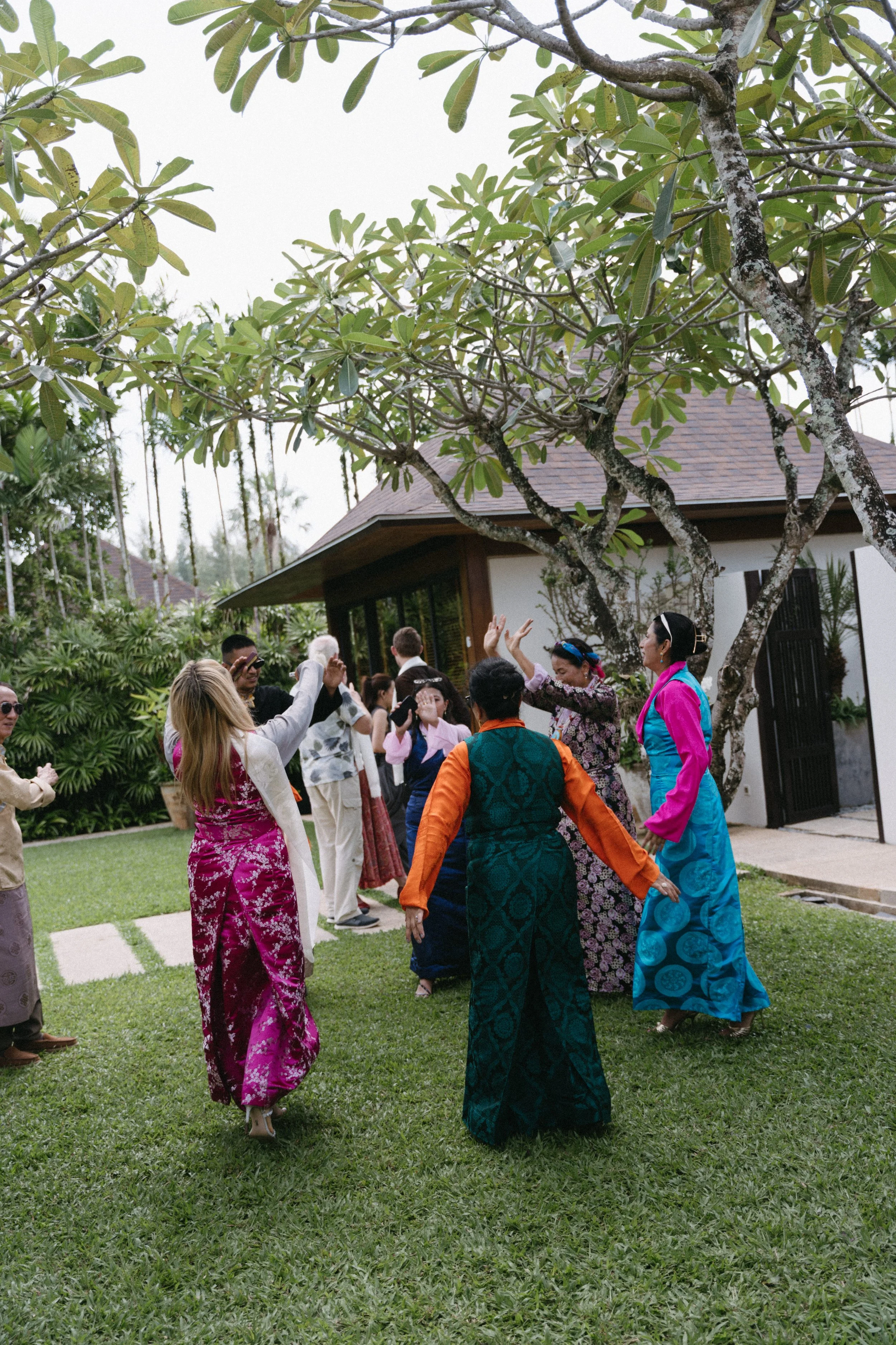 guests wearing colour traditional attire during Sikkimese Buddhist ceremony