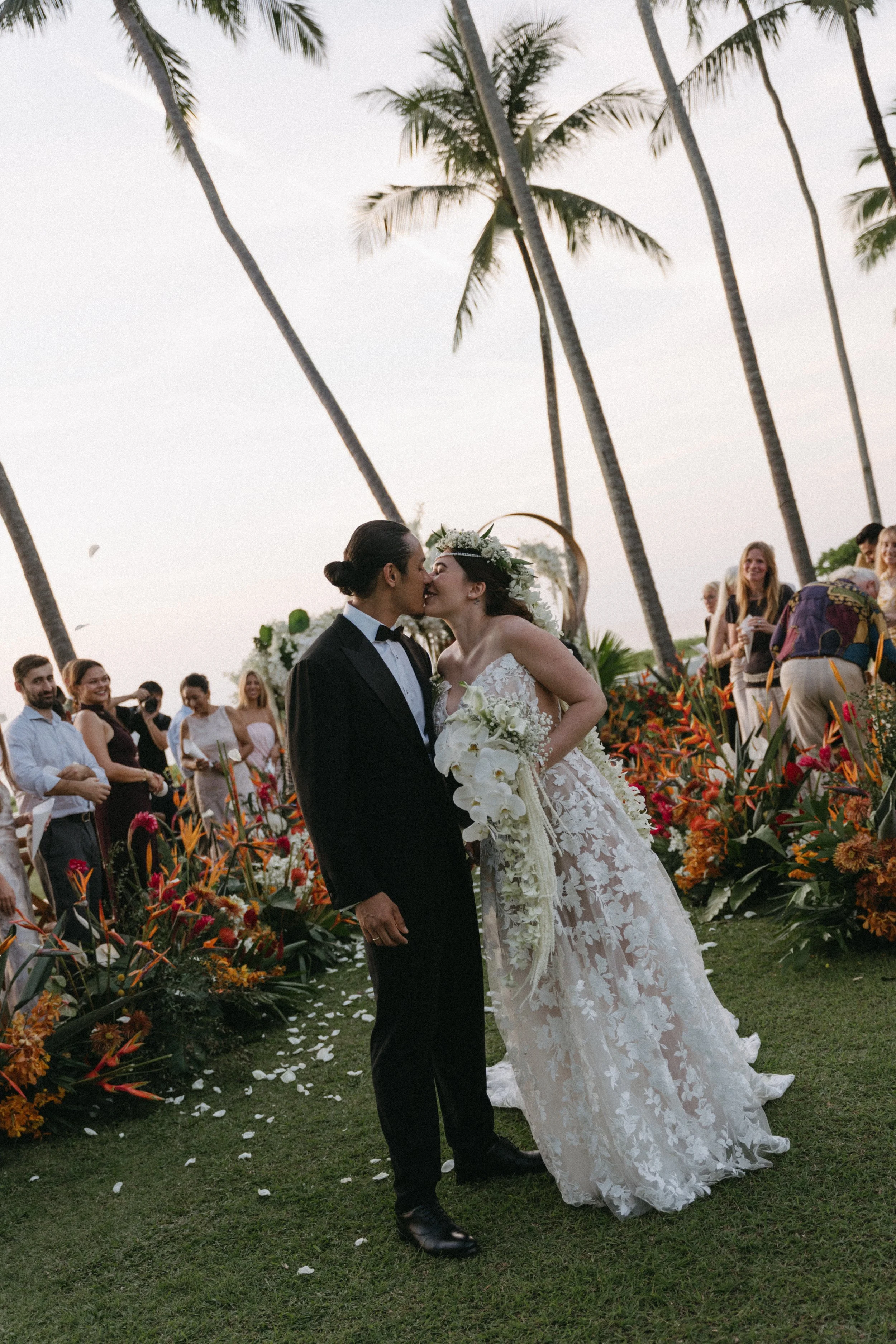 editorial shot of couple kissing after intimate wedding ceremony at jivana beach villas