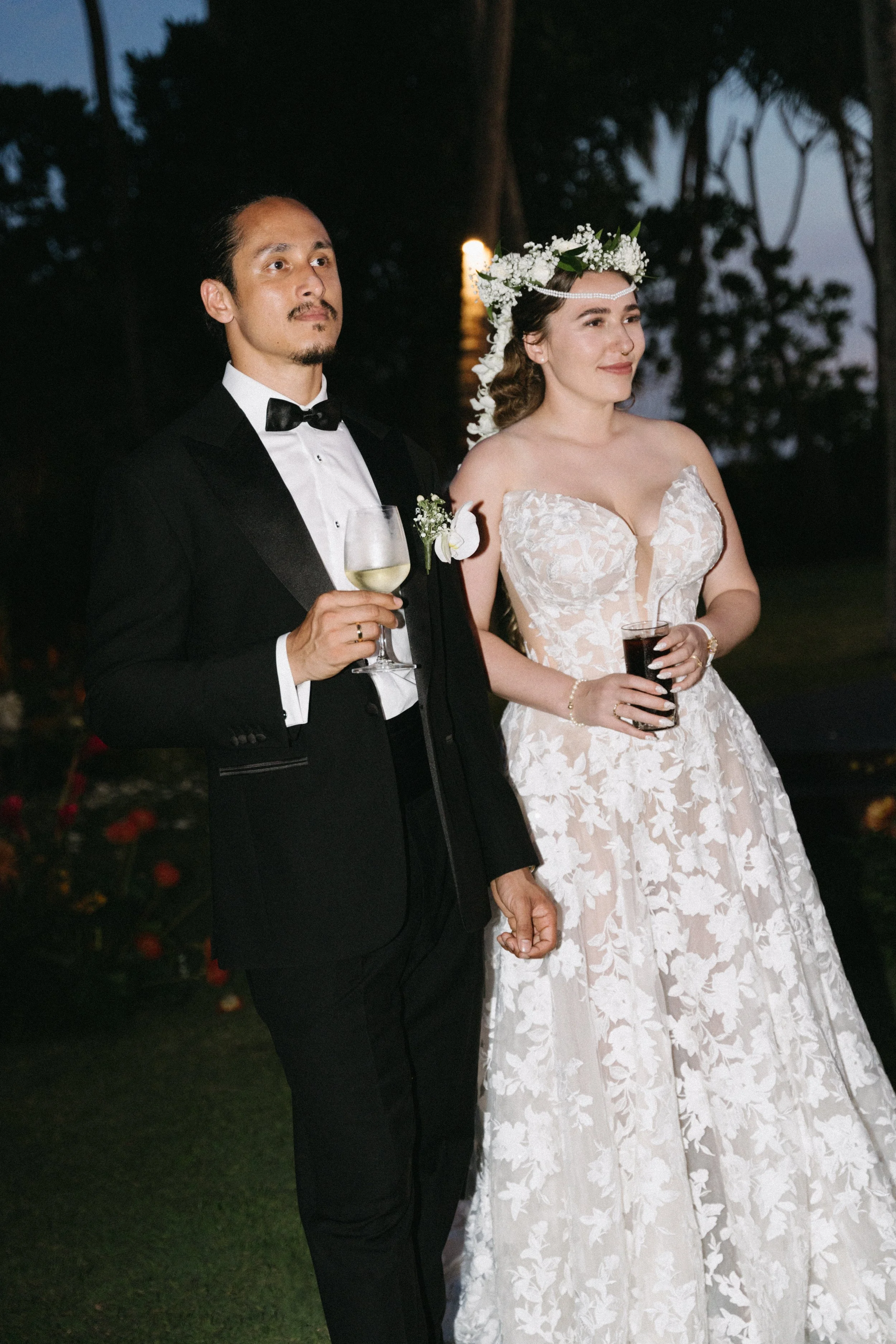 couple enjoying cocktail hour with guests before the wedding reception at jivana beach villas