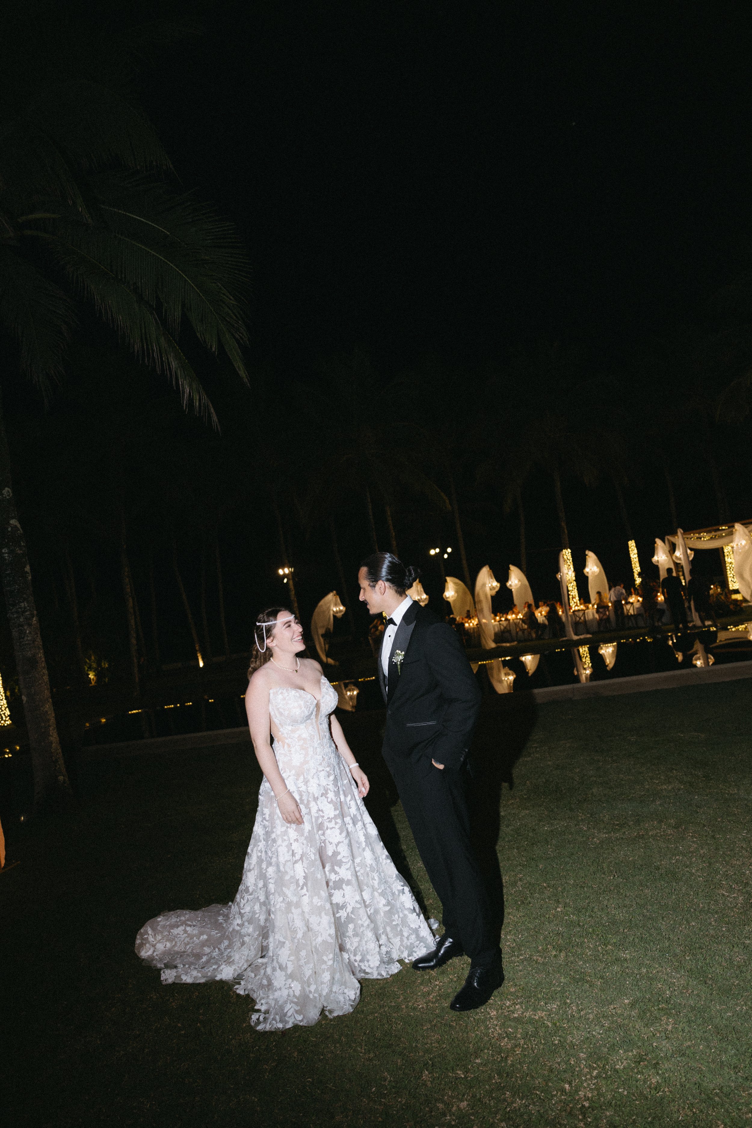 bride and groom enjoying a quiet moment away from the wedding reception