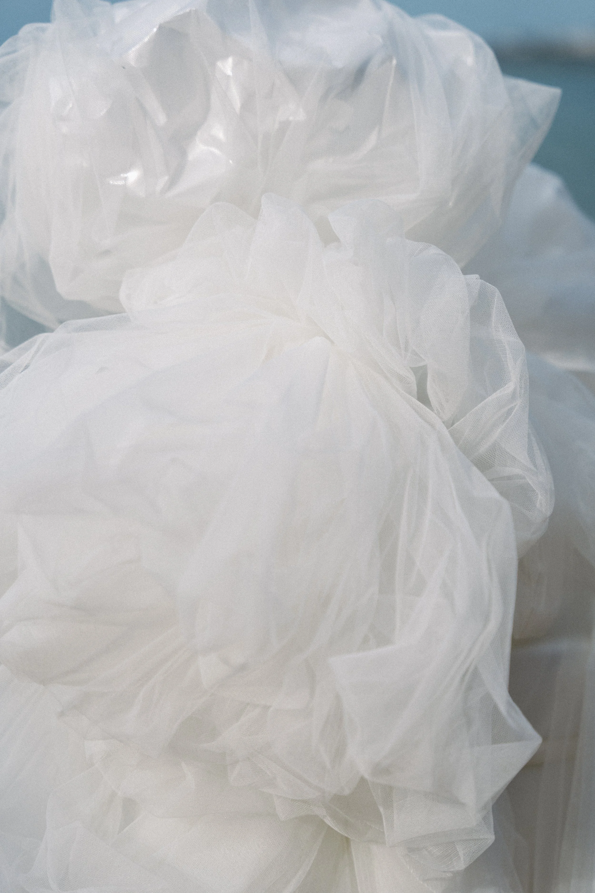 Soft white draping and flowing fabric detail at a luxury destination wedding ceremony on Bangrak Beach, Koh Samui