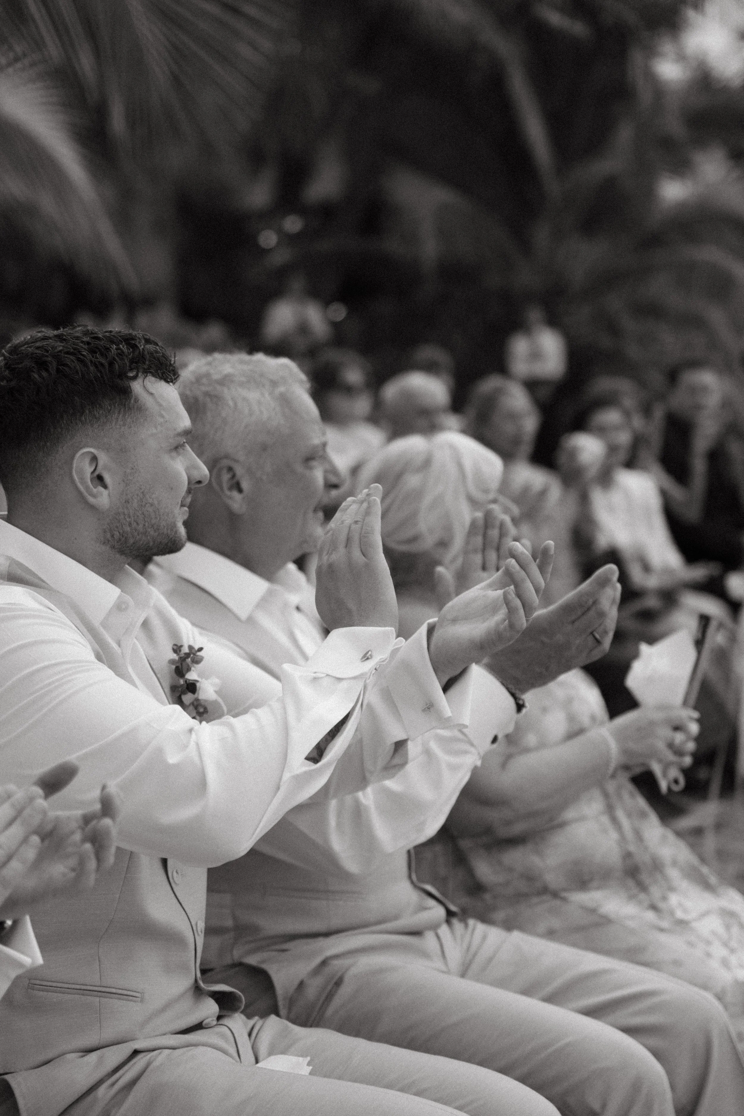 guests applauding during wedding ceremony